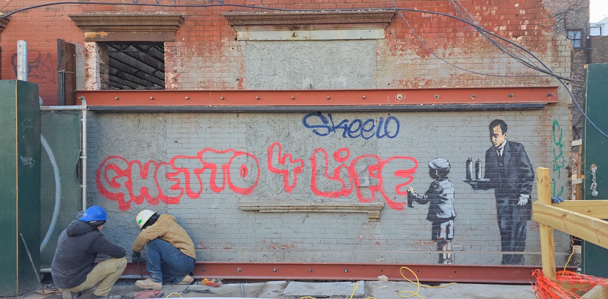 This is the last of three original Banksy pieces in New York. The mural — along with the entire section of wall it was painted on — was actually prepped to be moved to Connecticut after being purchased from a demolished building. Someone bought the e