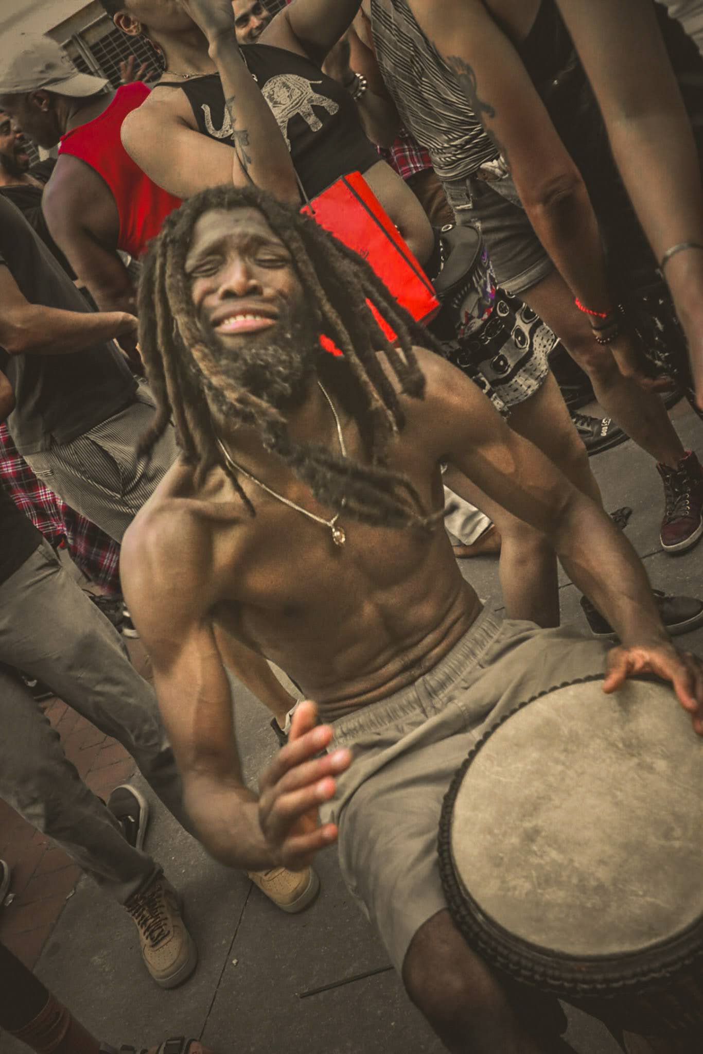 Percussion player conveying emotion at a Soul Summit event in Fort Greene Park, Brooklyn