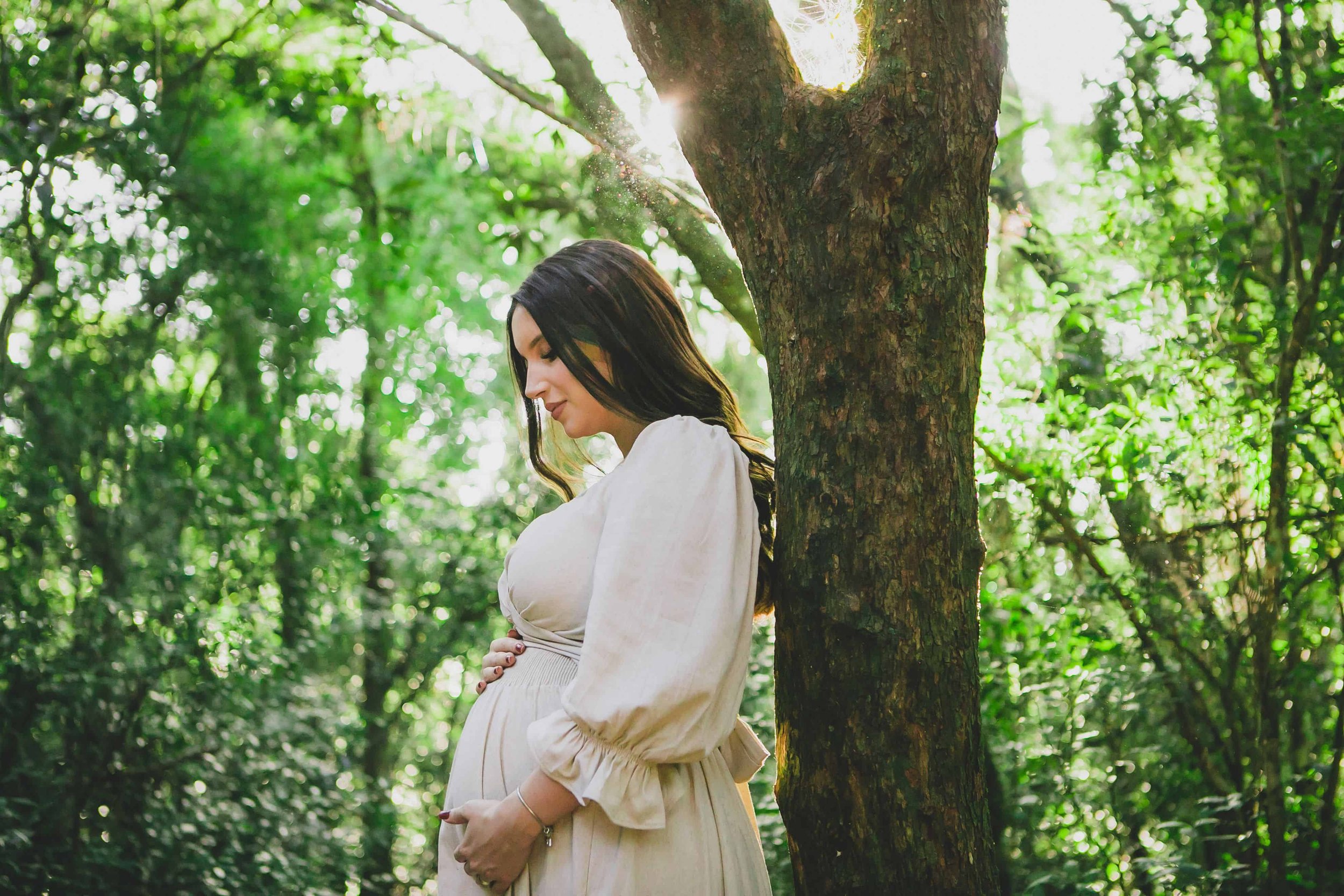 When to Seek Professional Support During Pregnancy or Early Motherhood-Pregnant woman holding her belly