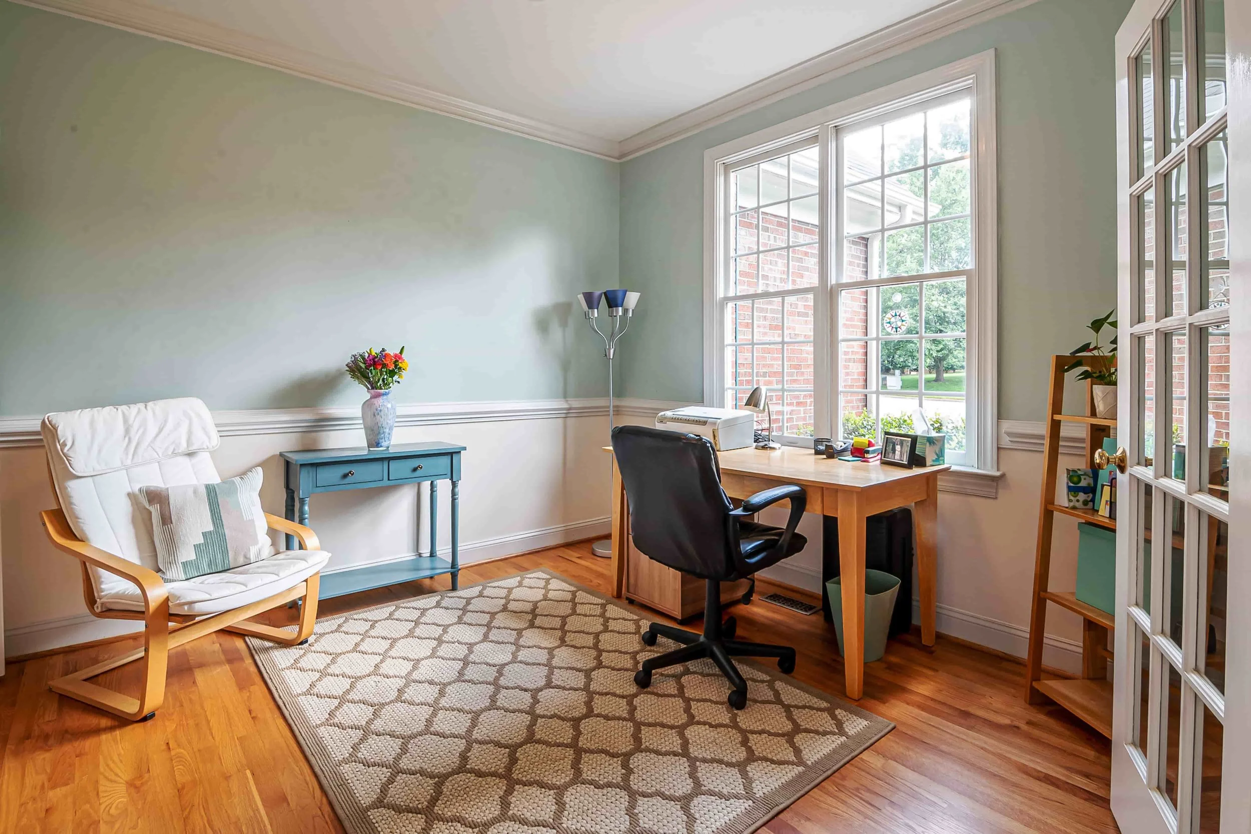When EMDR Is Often Recommended in Trauma Treatment- Office space with desk, chair, and sitting chair