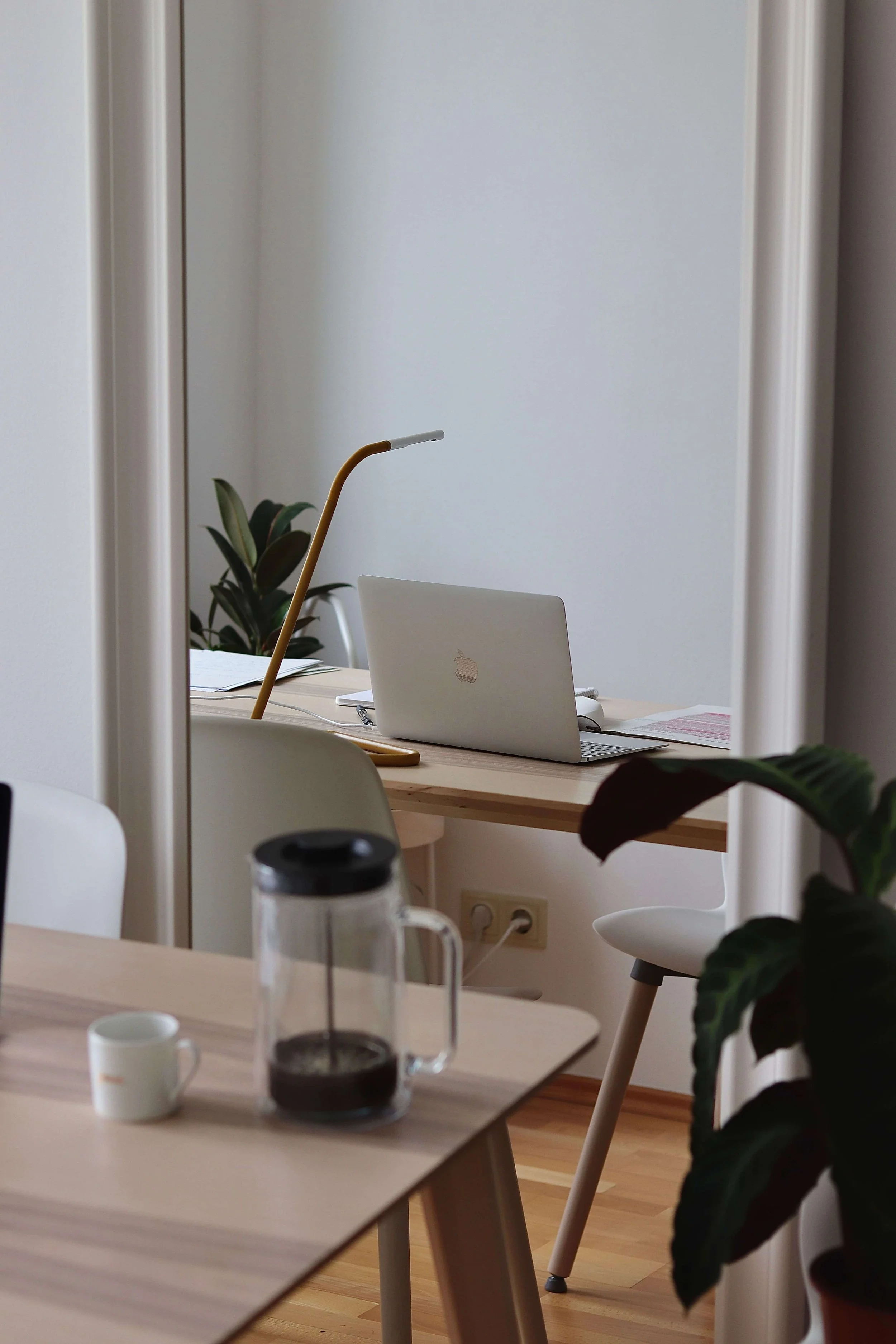Questions to Ask Before Choosing a Clinical Supervisor -aesthetic looking office with laptop and french press on a desk