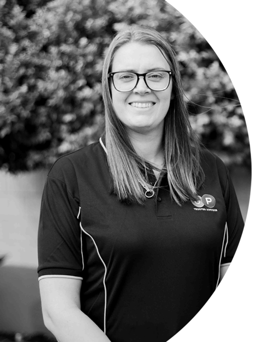 A professional black and white photograph of Cortney Prince a JP Trusted Advisor Support Coordinator