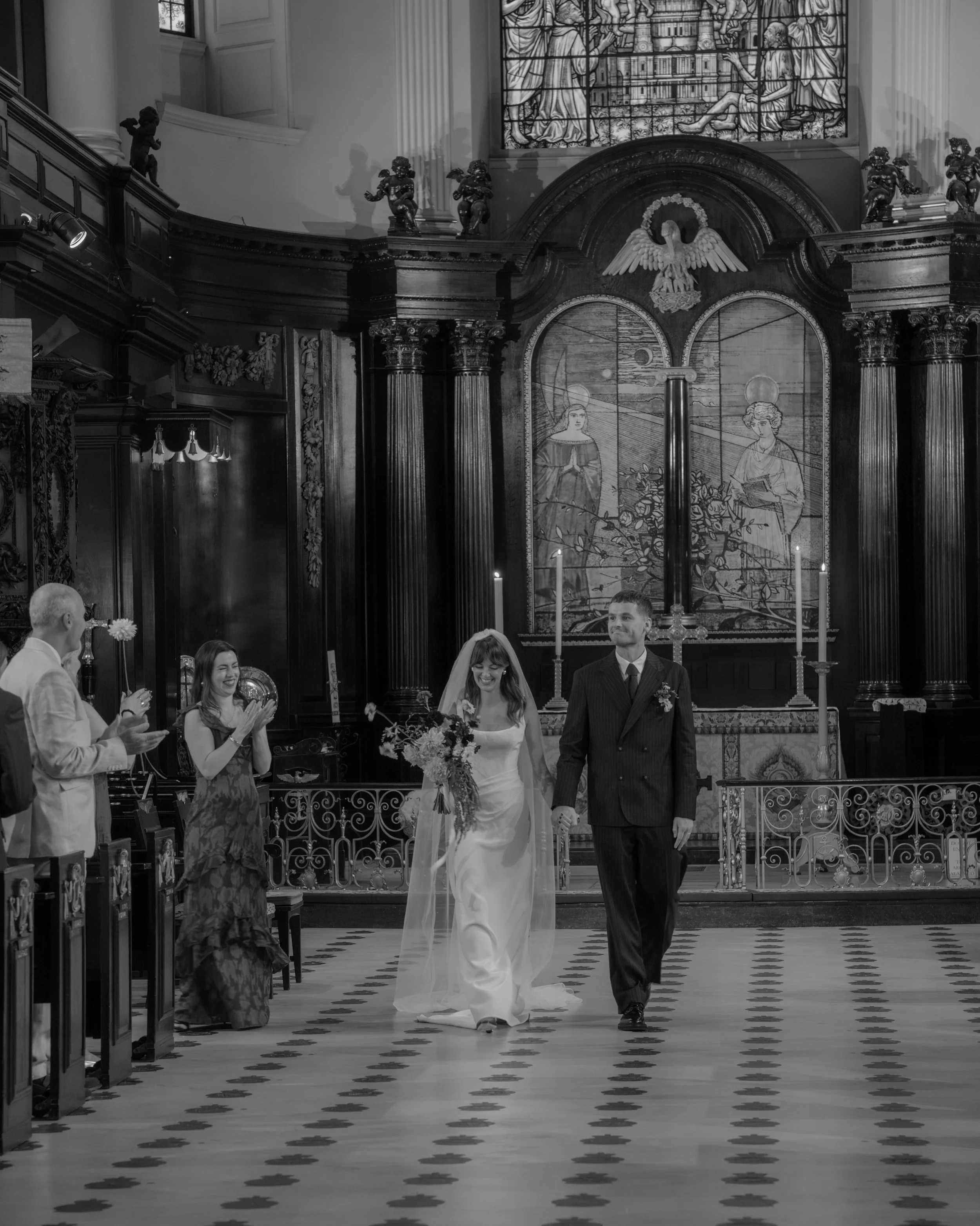 H&J - Ceremony - BW Walking down the isle .jpg