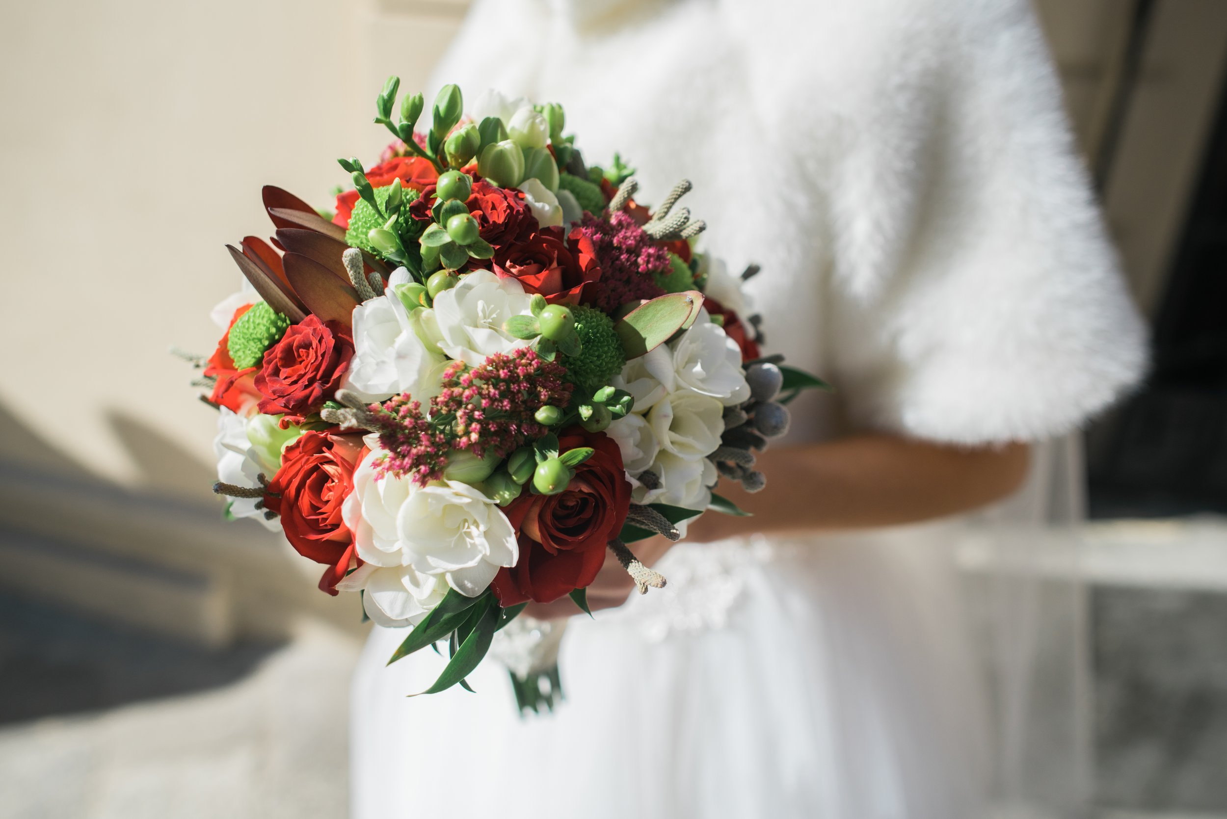 bride-keeps-wedding-bouquet.jpg