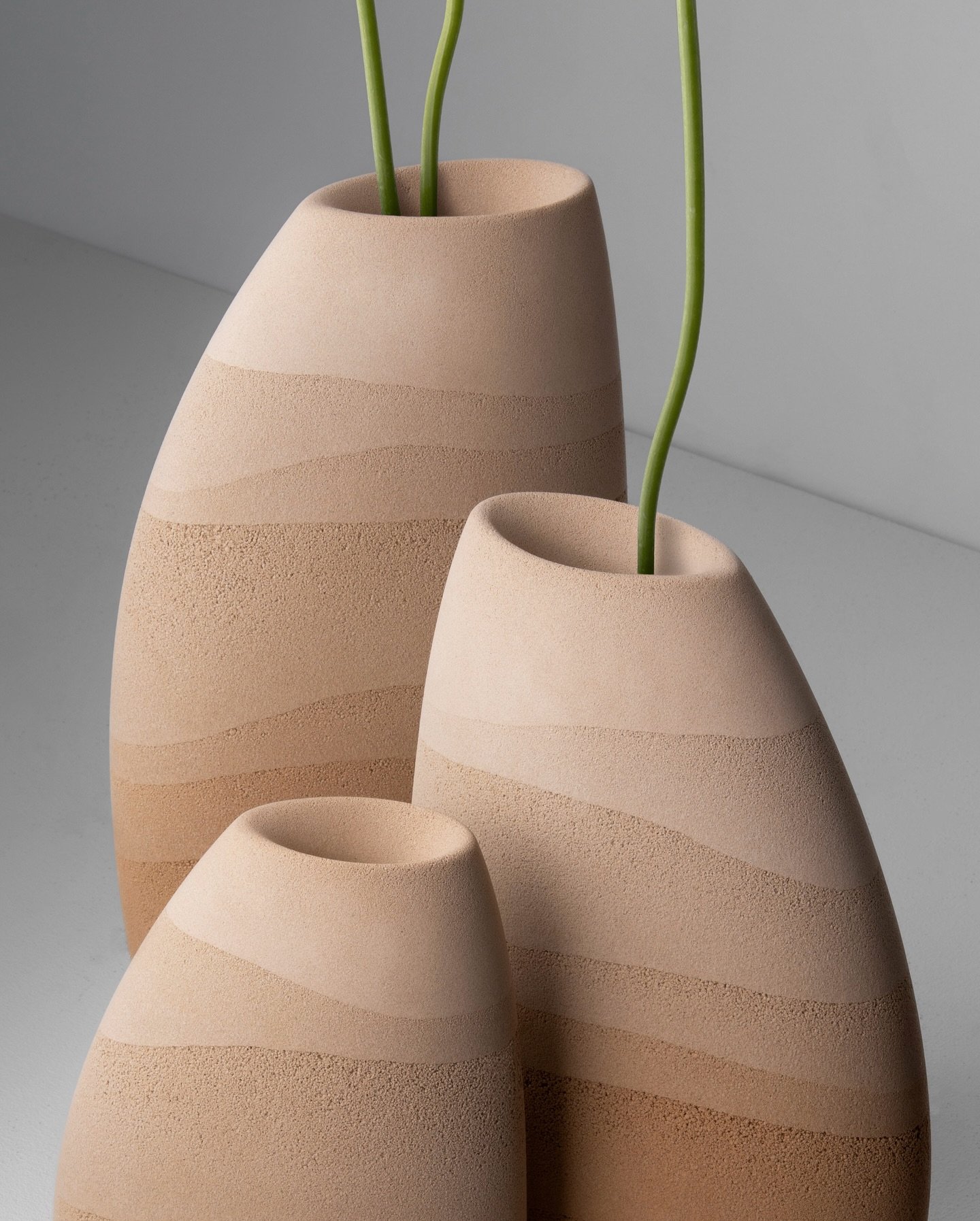 The &lsquo;Desert Drop&rsquo; stem vases bring new pieces of the landscape into the home; capturing a symbolic dialogue between flora and earth. 

Each vessel holds a removable and washable glass chamber for fresh water and flowers. 

The pieces are 