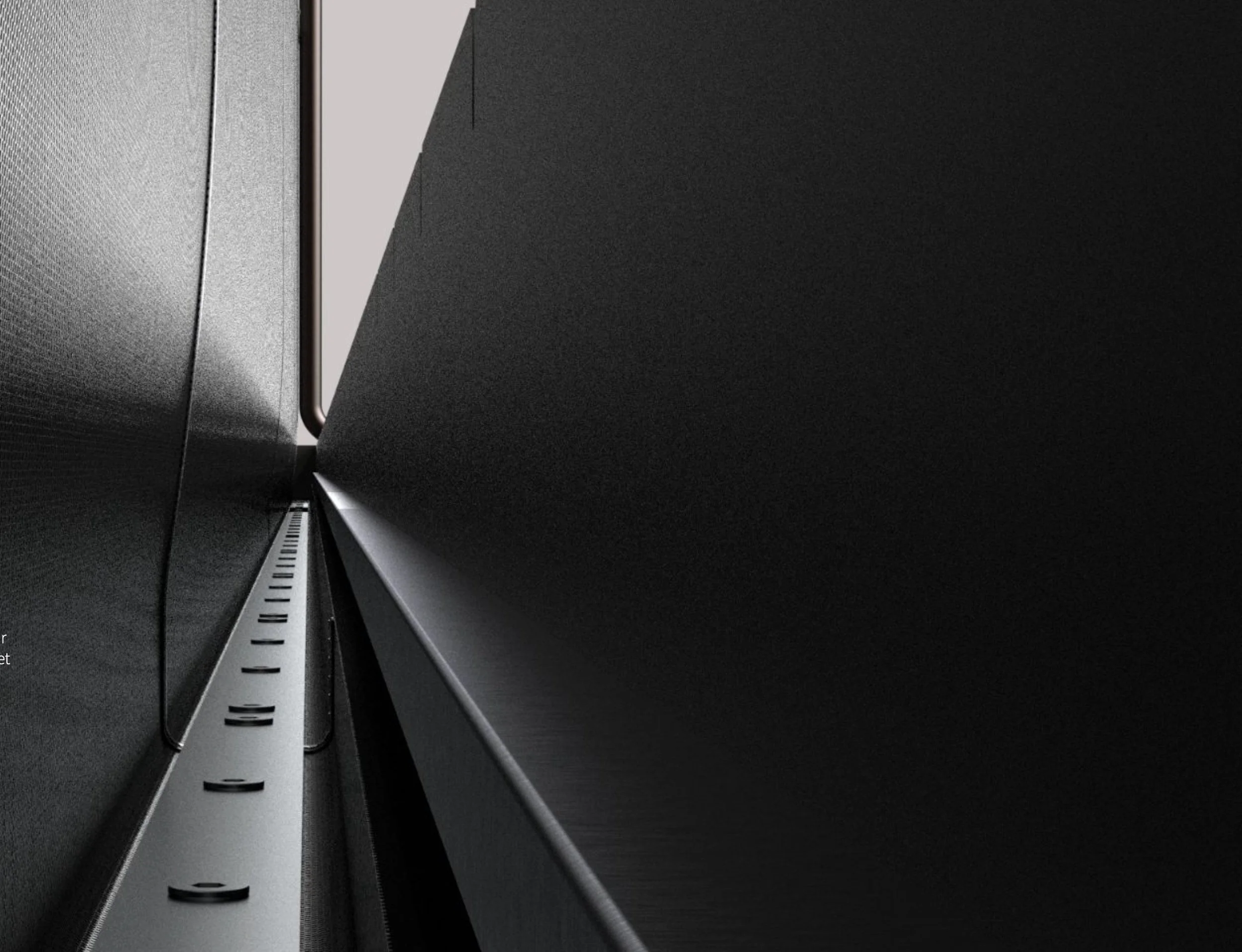 Close-up of a metal structure with parallel panels forming a narrow gap.