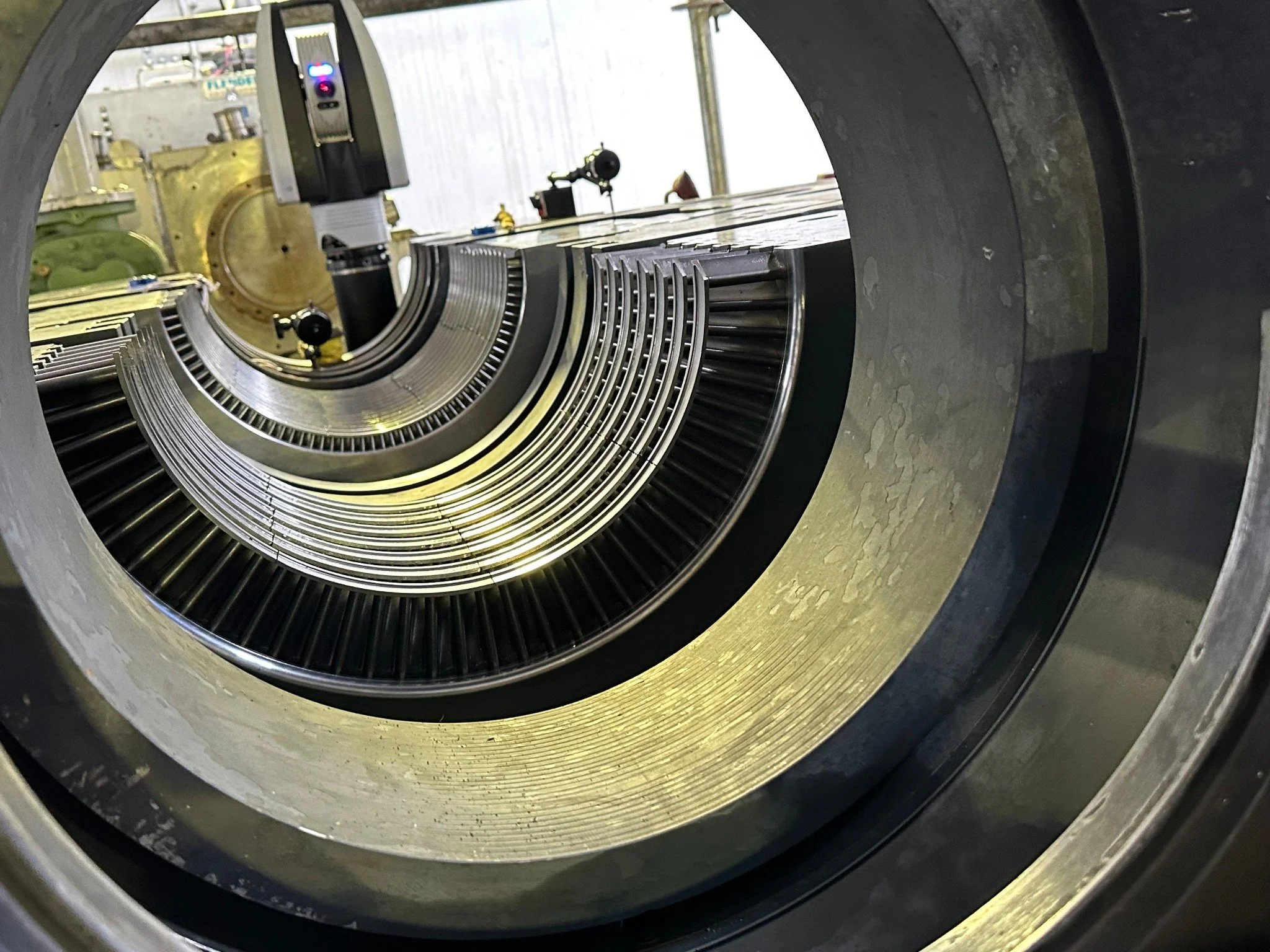 Laser tracker measuring internal alignment through a steam turbine nozzle