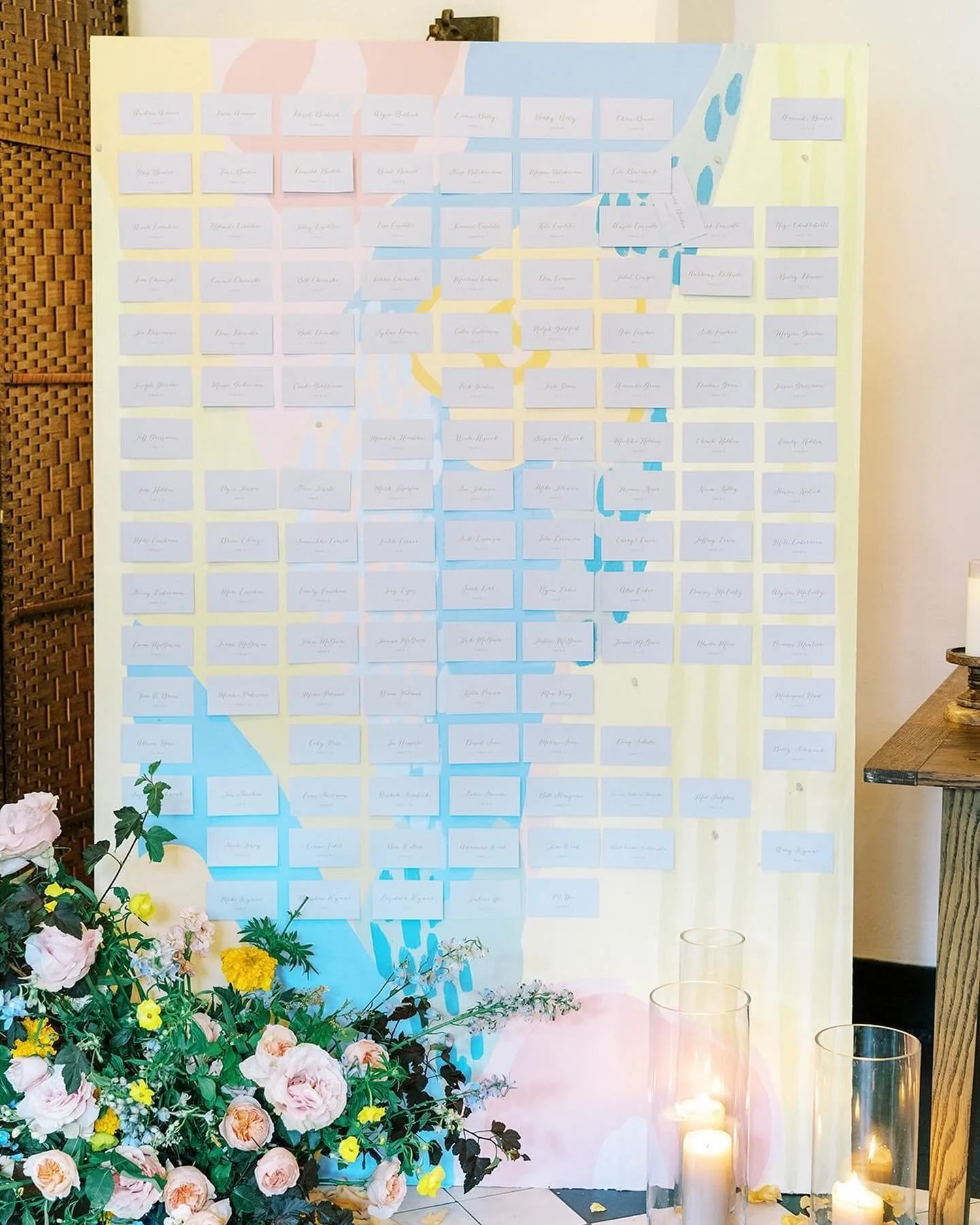 I&rsquo;ve been updating my website and wanted to share this super fun project I did for a stunning wedding back in 2021

I painted a large art piece for them to use as a display for their escort cards as well as matching mini art pieces for their ta