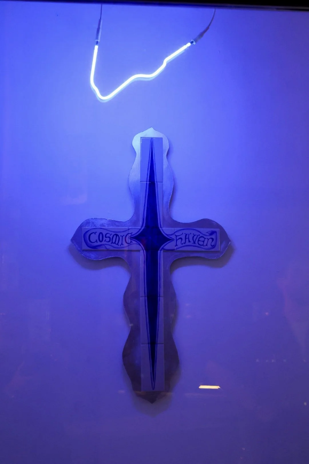 Celeste Hanchar -

Cosmic Haven, 2025
Porcelain tile, cobalt underglaze, mounted on a silver painted wood sword 