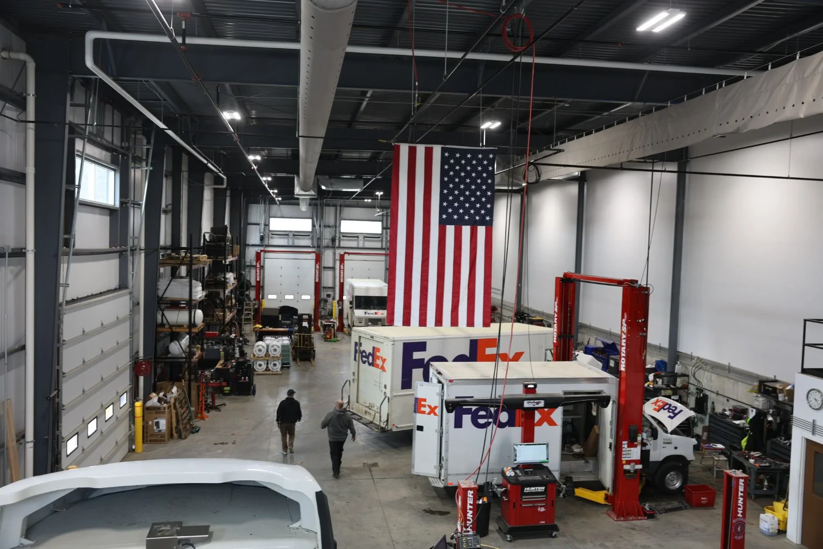 a drone picture inside of Optimus Fleet & Auto Repair's shop. Truck wash, trailer washout, diesel repair, propane autogas, fleet maintenance, Walker MI