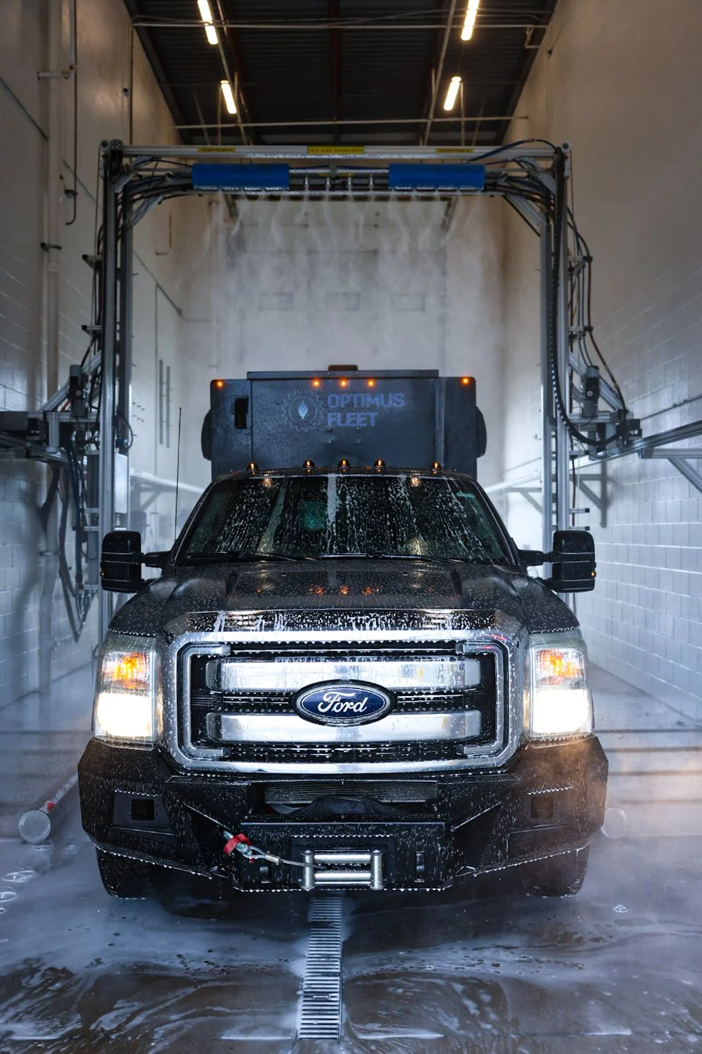 Optimus Truck Wash is built for large vehicles: semis, box trucks, RVs, heavy-duty pickups, and more. Roll in any time, choose your wash, and pay right at the entry — no appointment, no wait list.