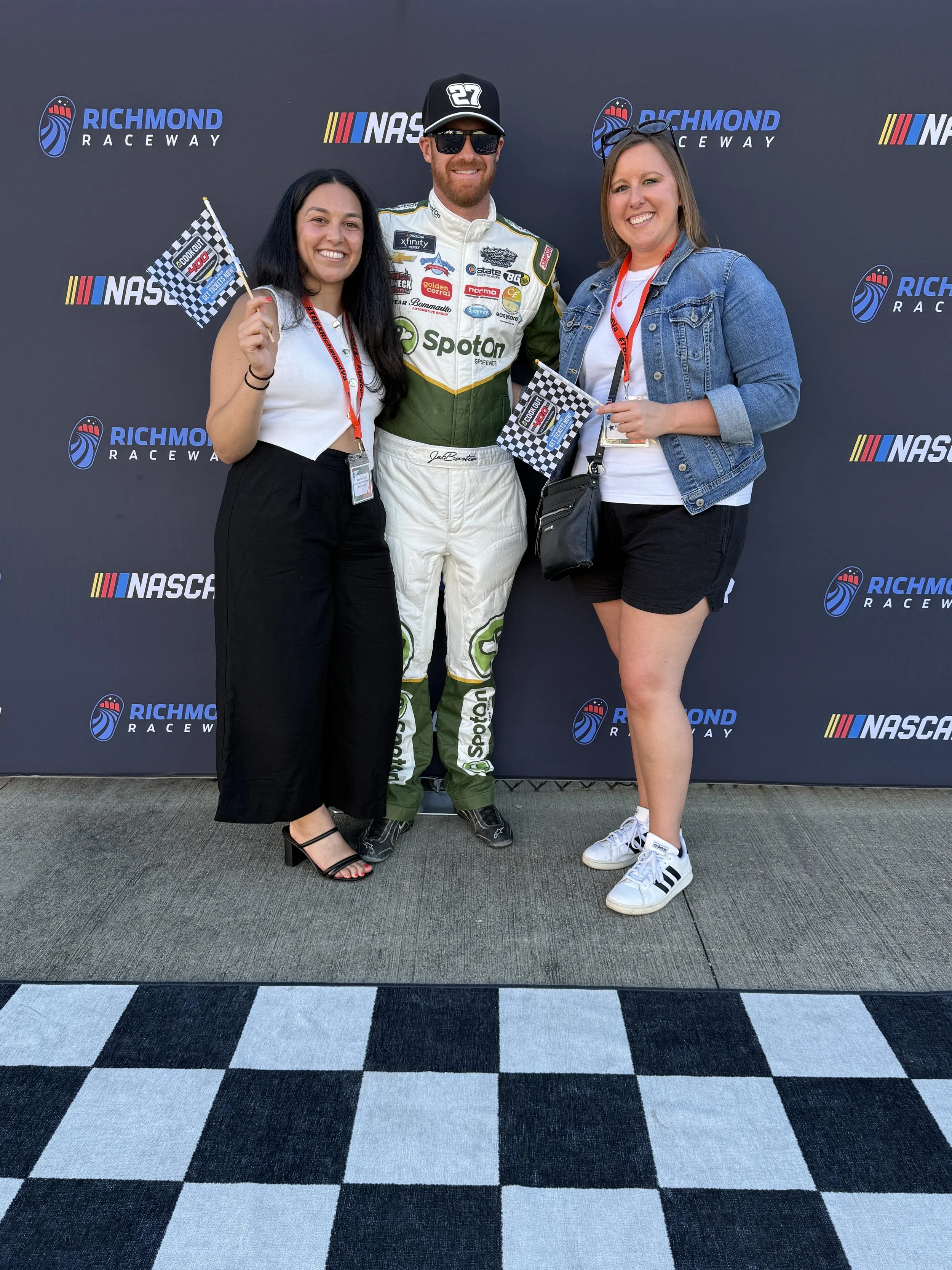 Katie Rockey and friend with professional driver, Jeb Burton at the Richmond Raceway in Richmond, Virginia