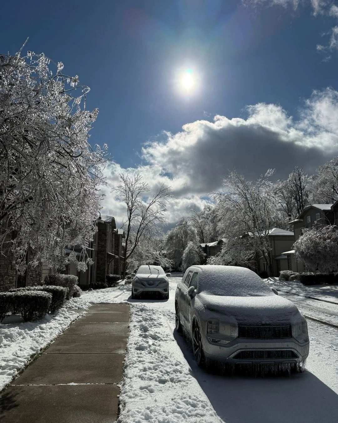 Sun is shining outside in a snowy ice covered neighborhood in Nashville, Tennessee
