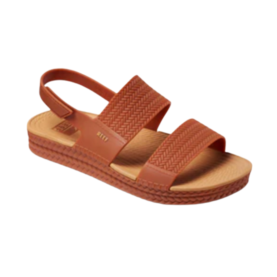 Brown sandal with textured straps on a white background.