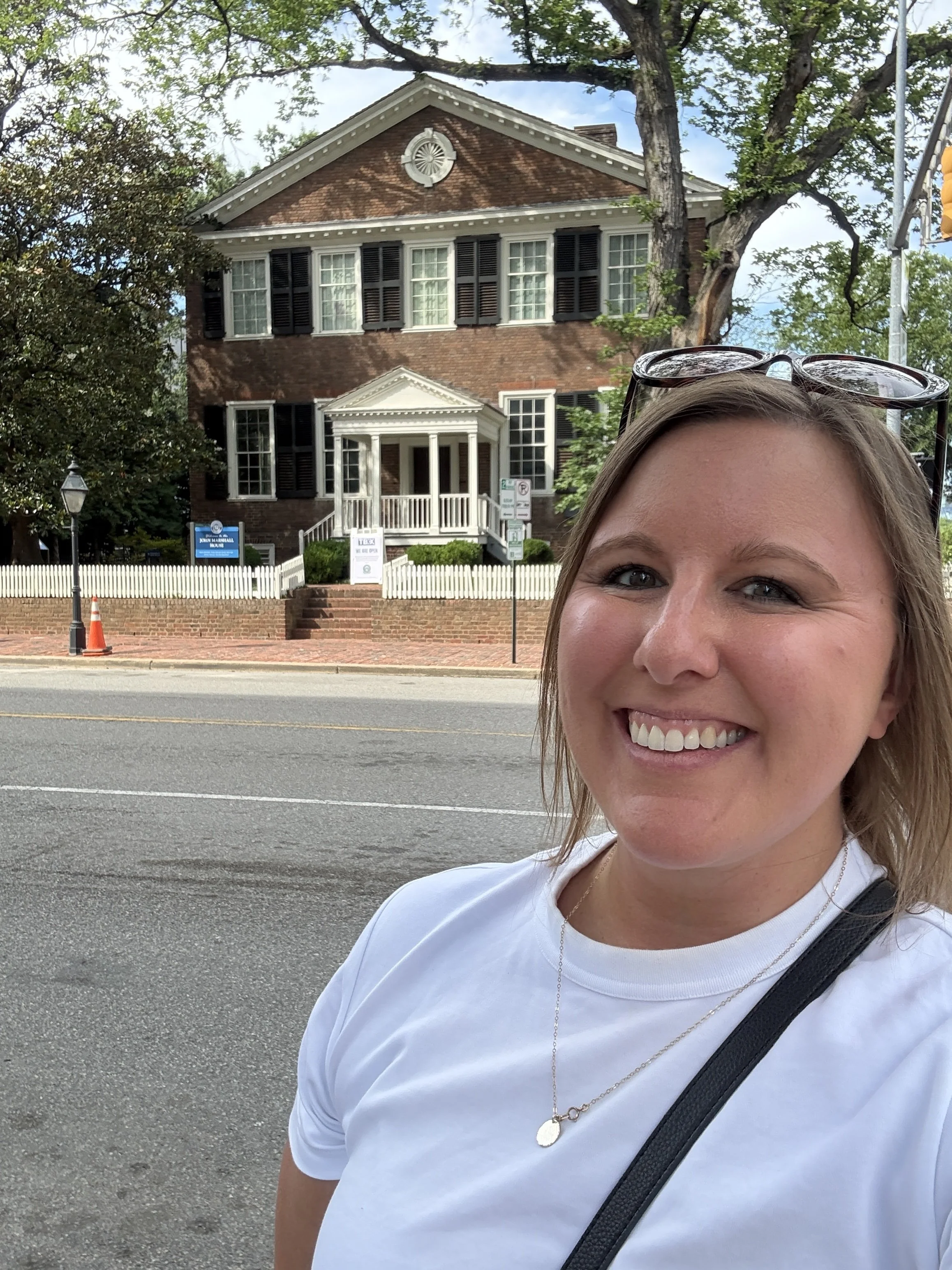 Katie Rockey in front of historic home in Richmond, Virginia