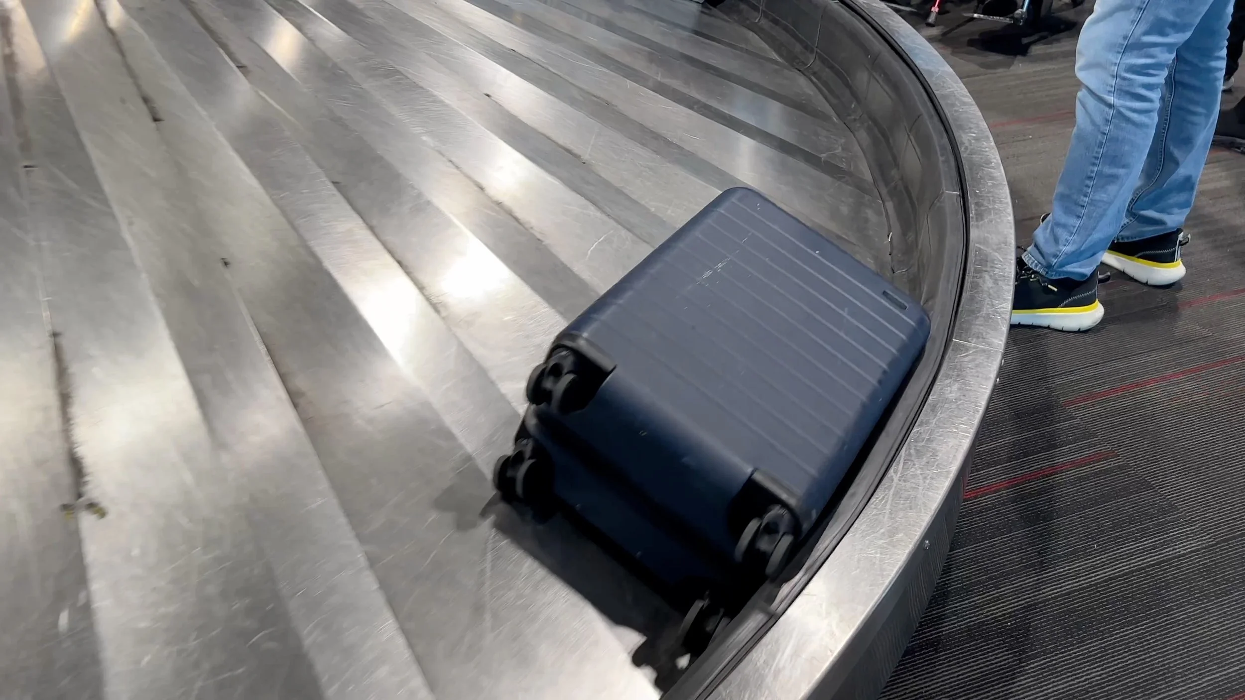 Bigger Carry-On Suitcase at the baggage claim