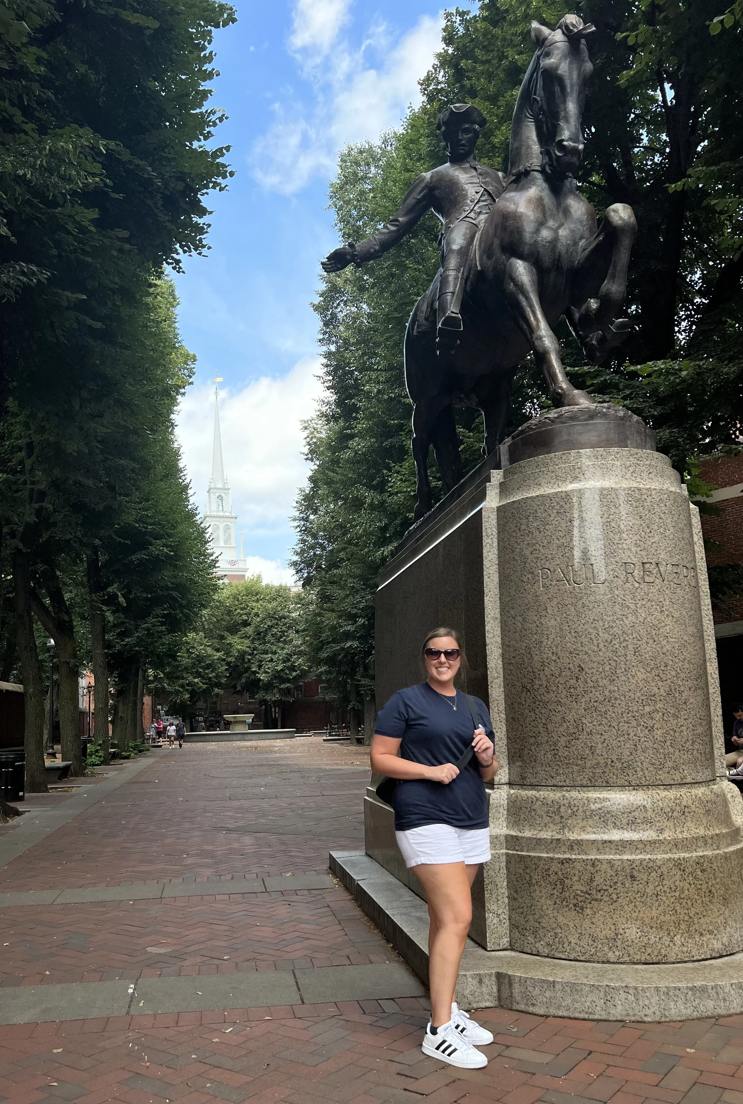 Katie Rockey next to the Paul Revere statue in Boston, Massachusetts