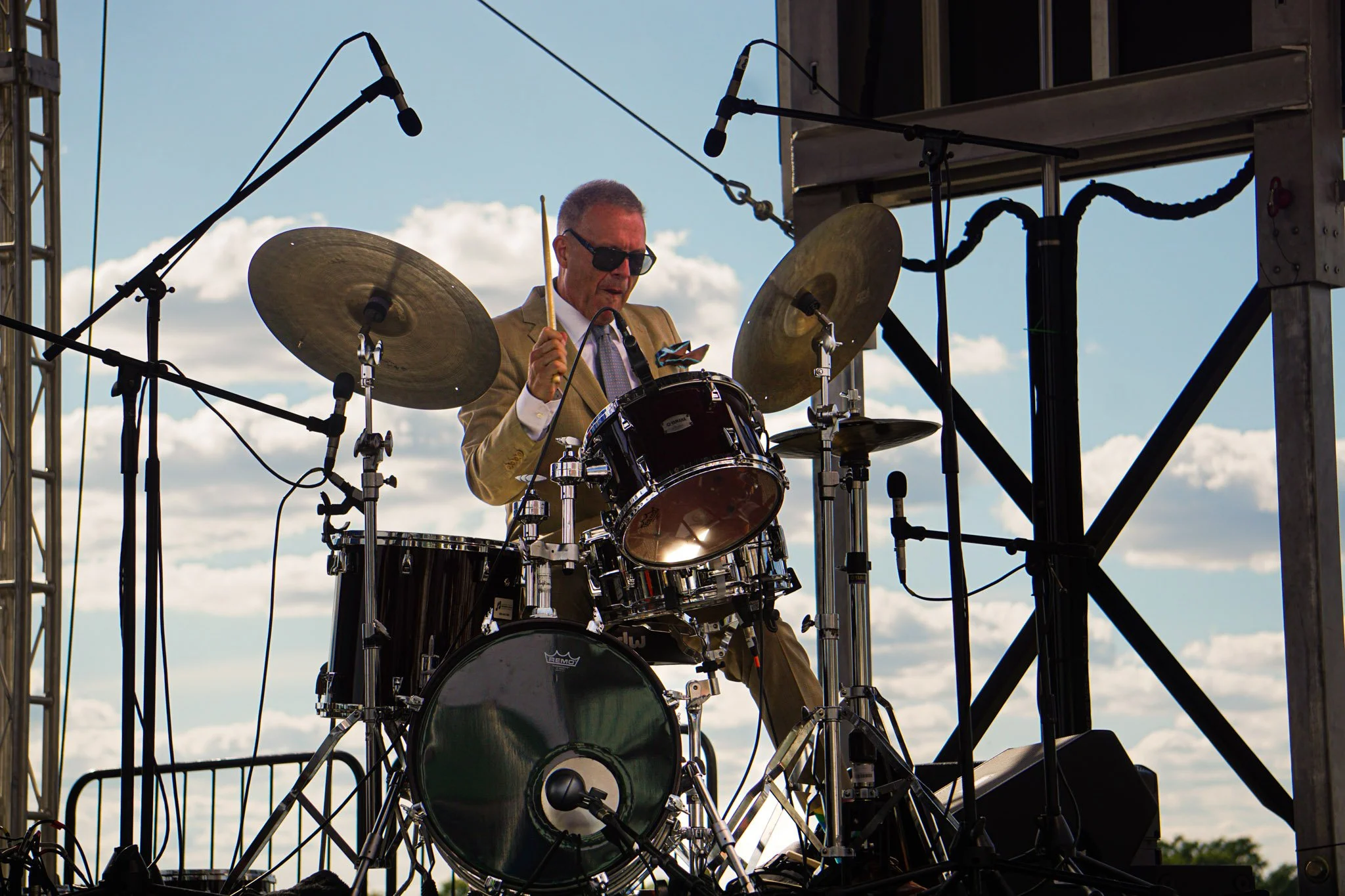 A drummer man playing at DC Jazz Festival.