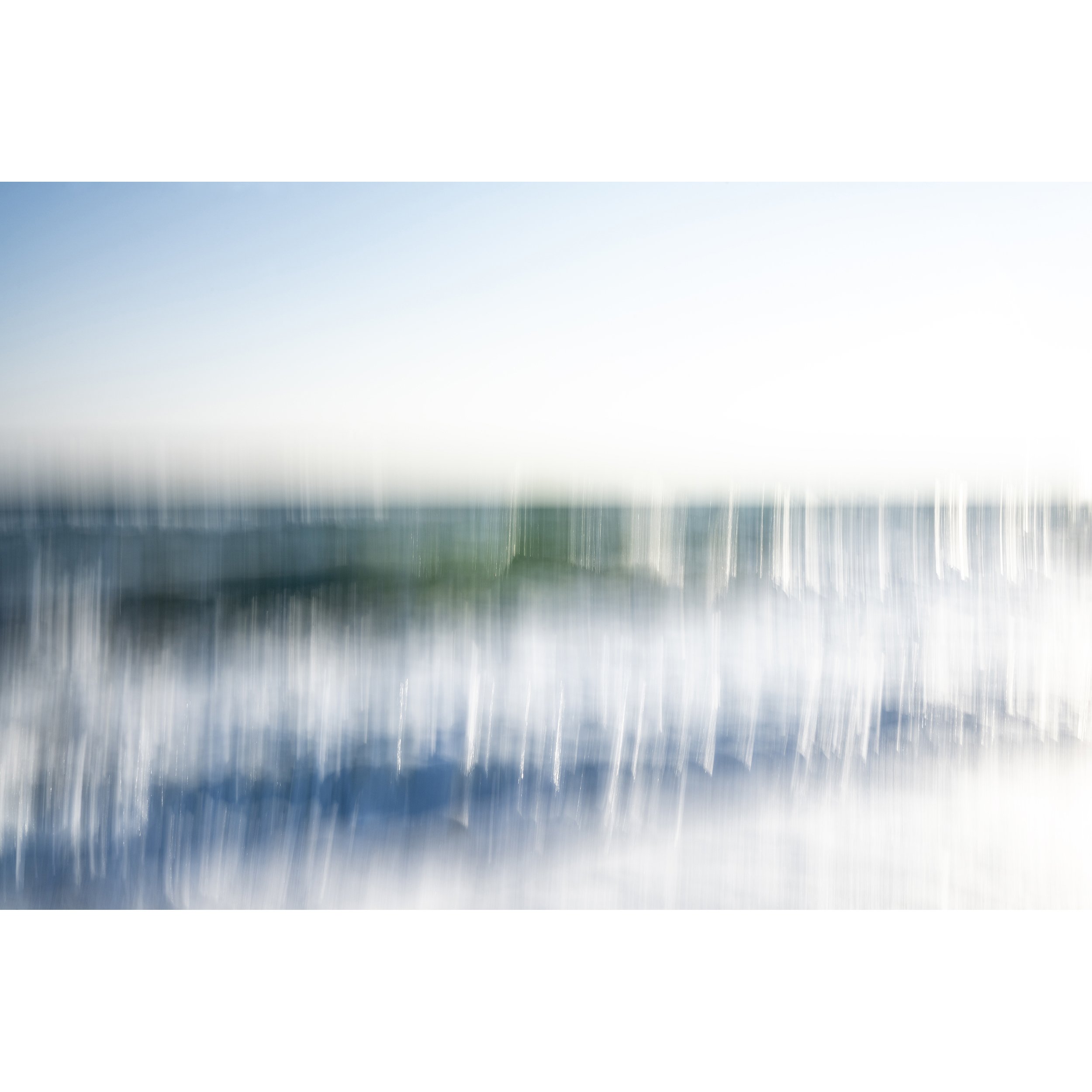 a fine art photograph for sale contemporary artwork brightly colored picture of a wave breaking on the shore that is painterly and abstract bright and sunny colorful modern contemporary