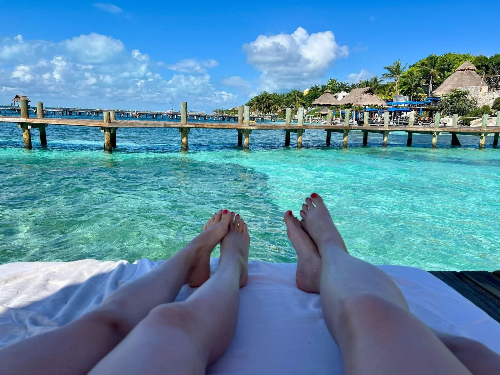 Swim-out suite and palms at a luxury adults-only resort on Mexico’s Caribbean coast