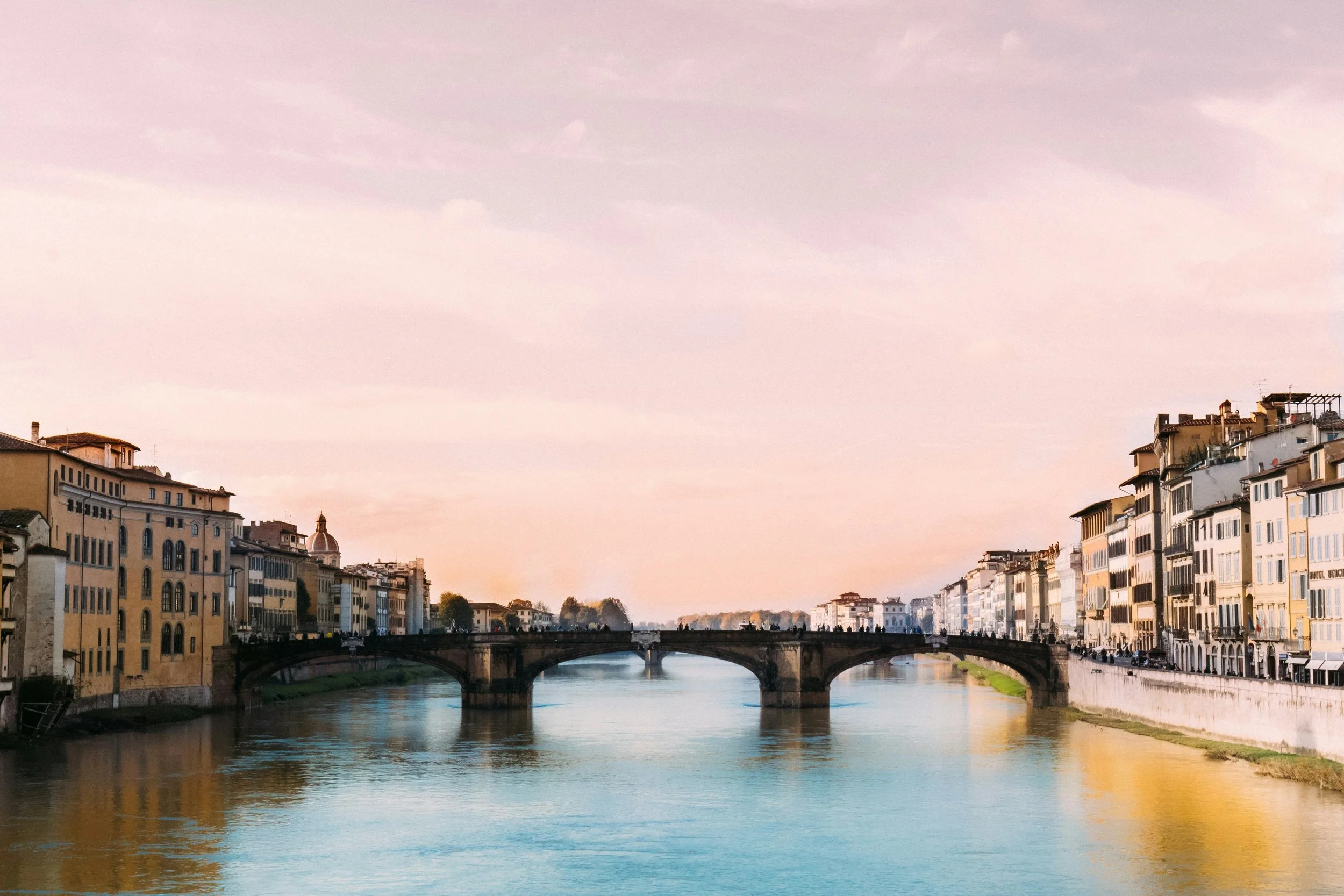 Ponte Santa Trinita, a historic bridge spanning the Arno River in Florence, Italy.
