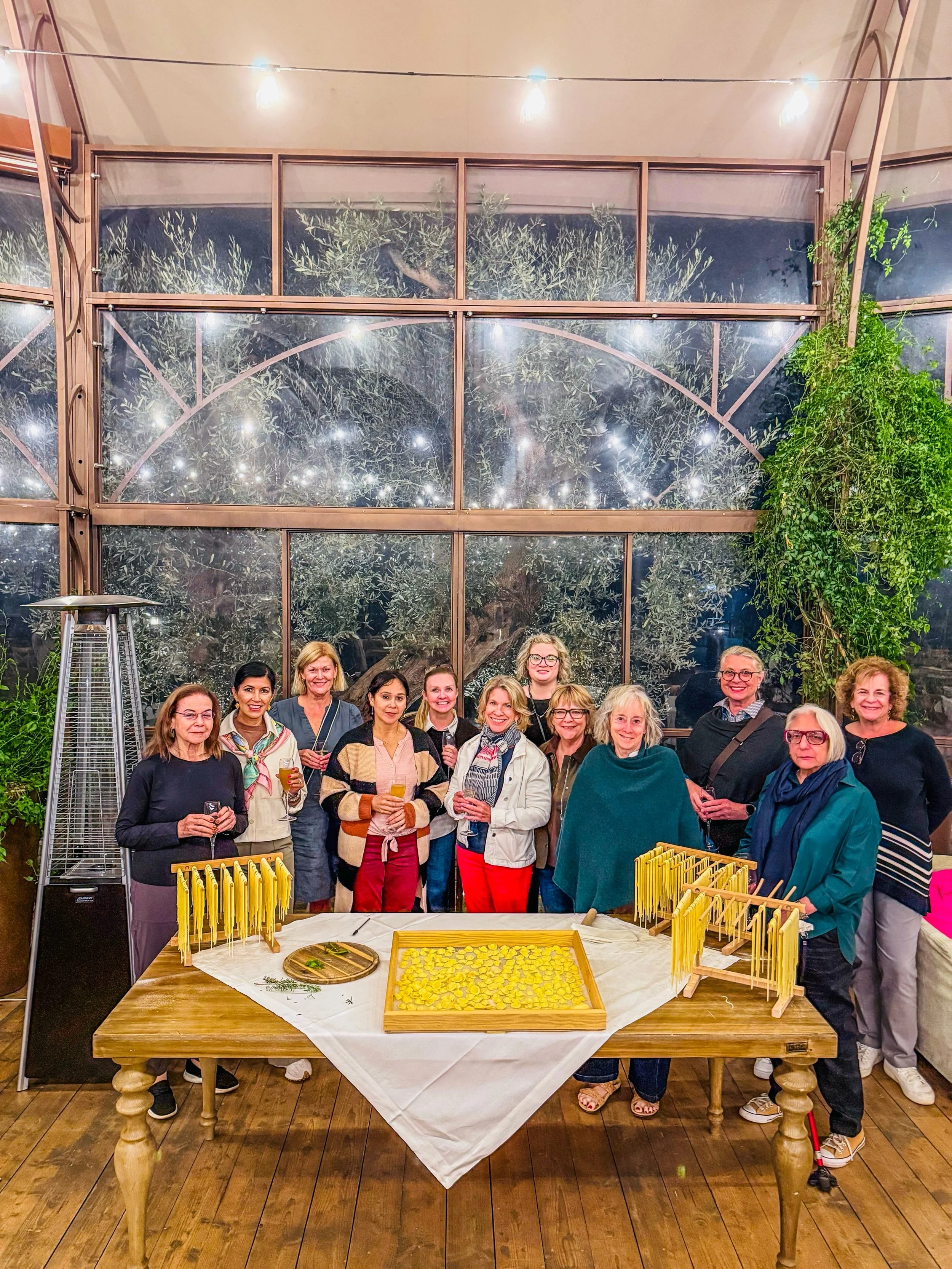 Alleys, archaic villages, vast olive groves, workshops, and of course kitchens. That is how one of our 2026 travelers described her itinerary in her review. She could have been describing ours.

We pressed orecchiette by hand. We watched tray after t