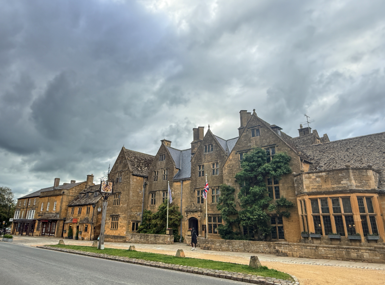 The Lygon Arms, a historic coaching inn with honey-colored Cotswold stone architecture in Broadway, England.