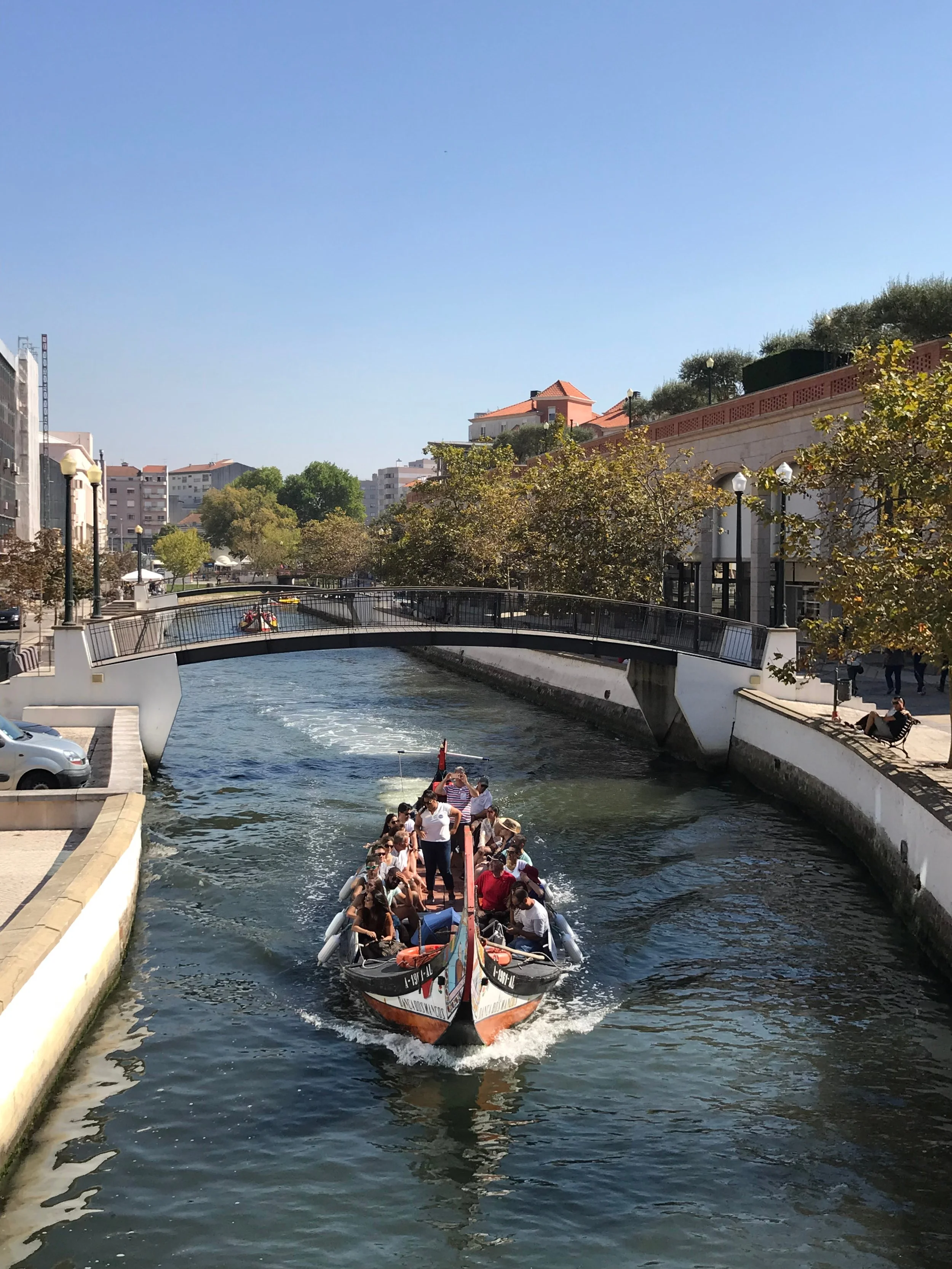 Traditional moliceiro boat on a canal in Aveiro, Portugal.