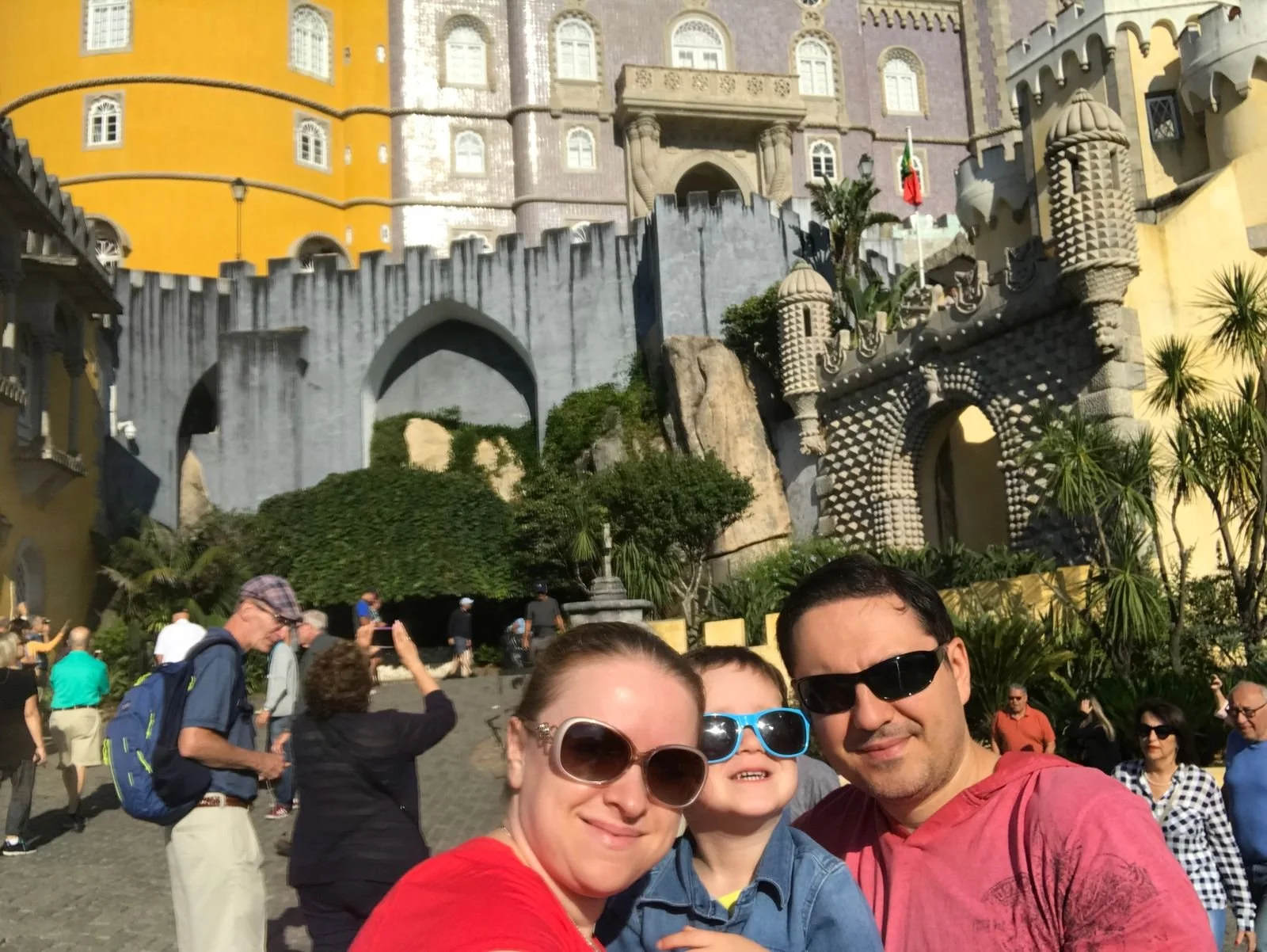 Pena Palace, a vibrant hilltop landmark with colorful Romantic architecture in Sintra, Portugal.