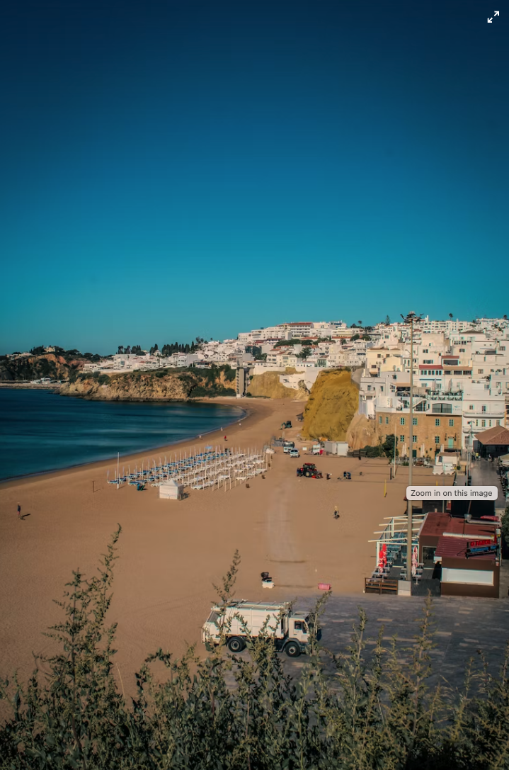 Praia dos Pescadores below the historic cliffs of Albufeira Old Town, Portugal.