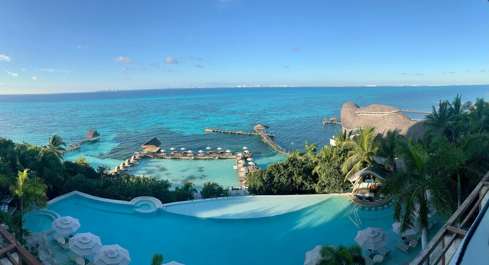 Adults-only pool and wide Caribbean beach on the Costa Mujeres coastline north of Cancun, Mexico