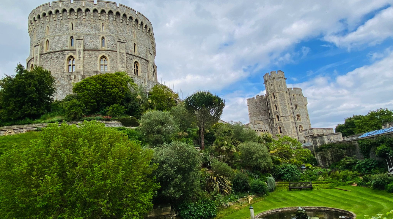 Windsor Castle, a historic royal castle with its iconic Round Tower and Moat Garden in Windsor, England.