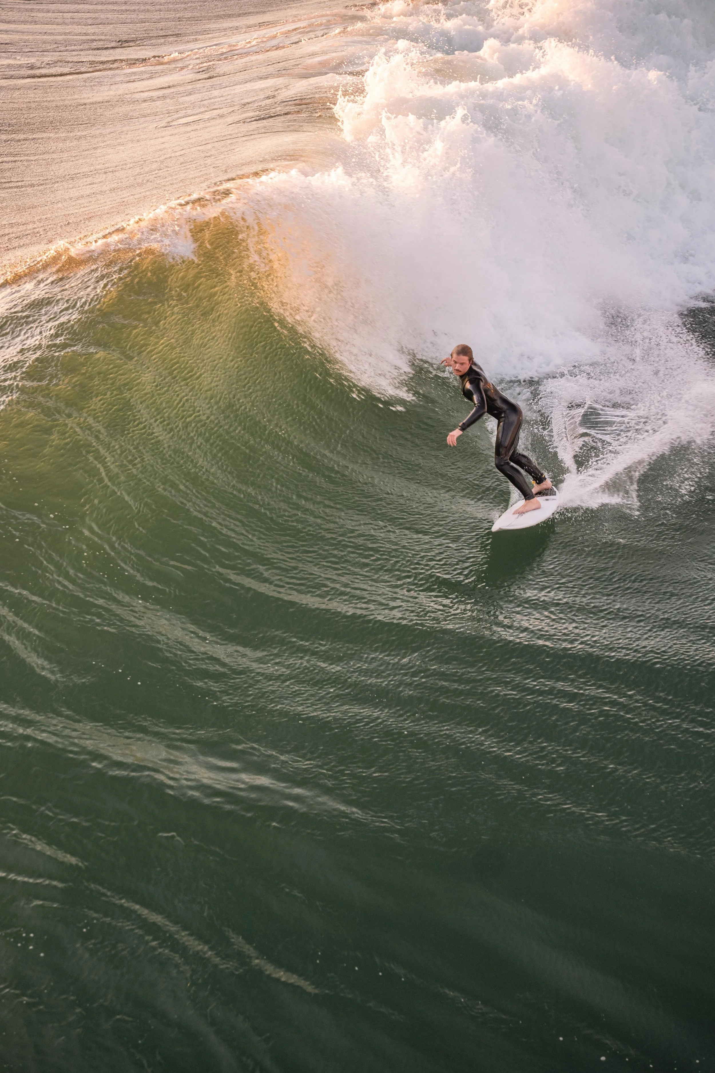 Ireland’s Wild Atlantic Way, known for scenic surf beaches, powerful waves, and rugged coastal landscapes.