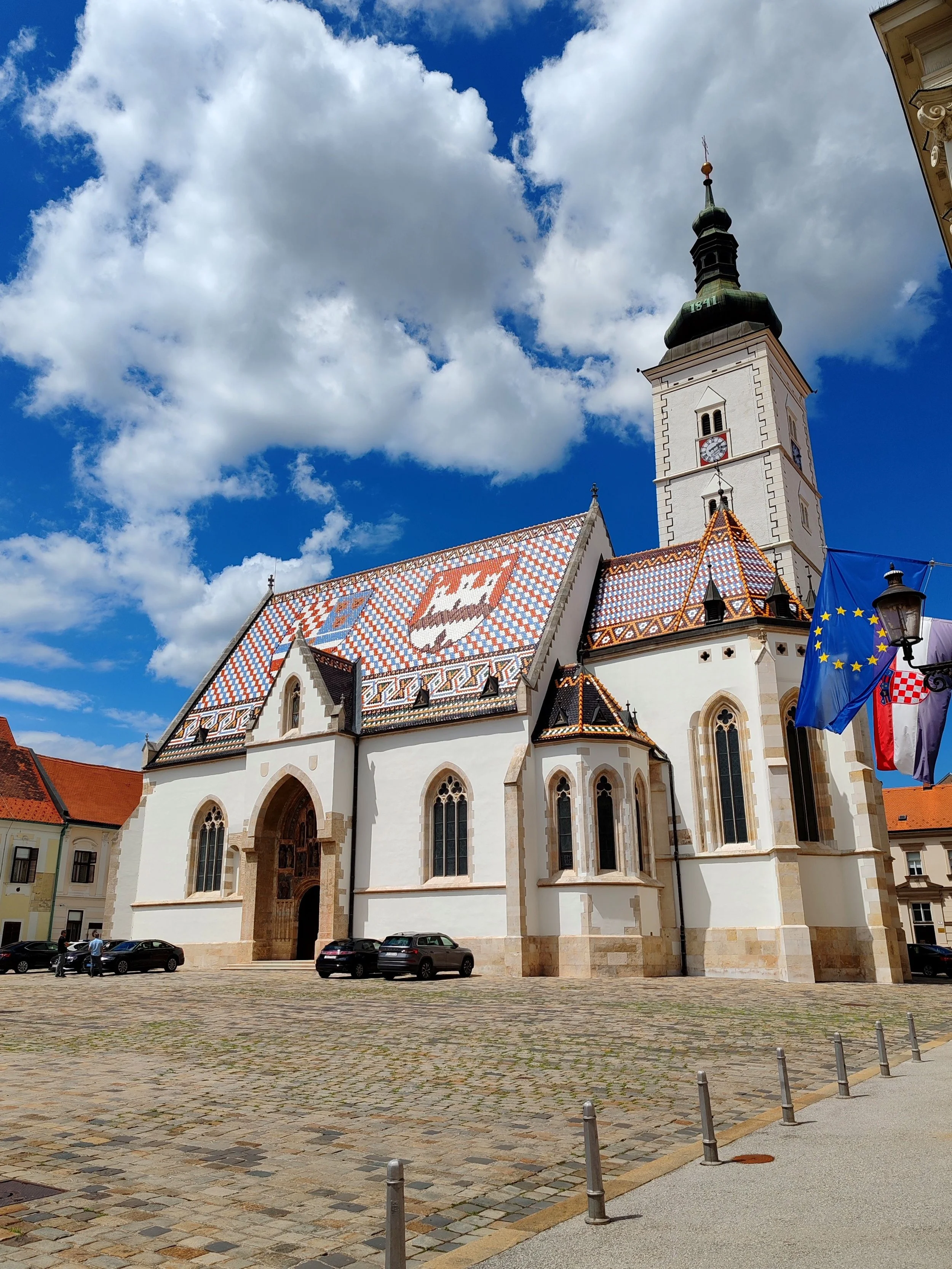St. Mark’s Church in Zagreb, Croatia, known for its colorful tiled roof featuring the coats of arms of Zagreb and Croatia.