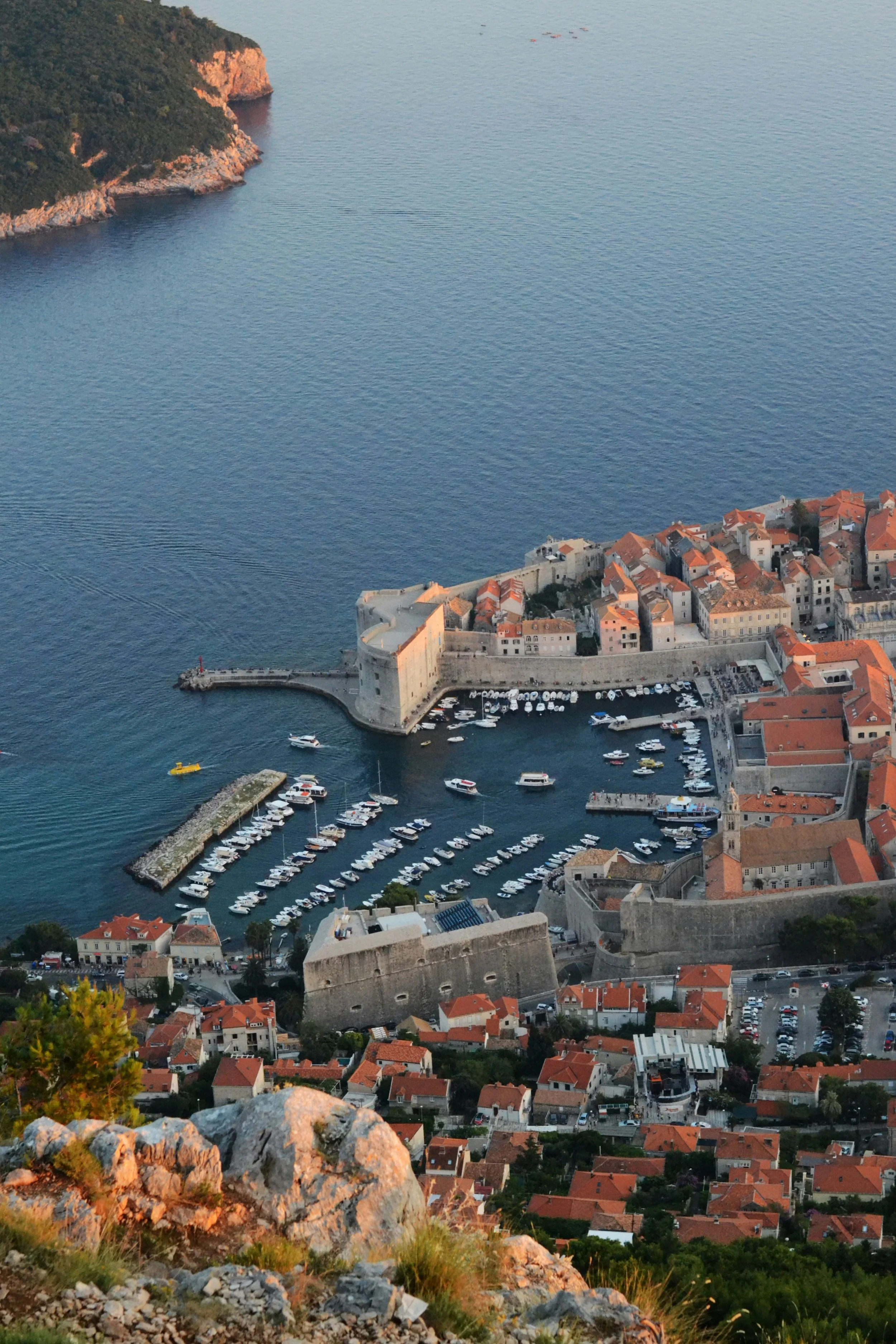 Dubrovnik, Croatia, featuring its historic city walls overlooking the blue Adriatic Sea.