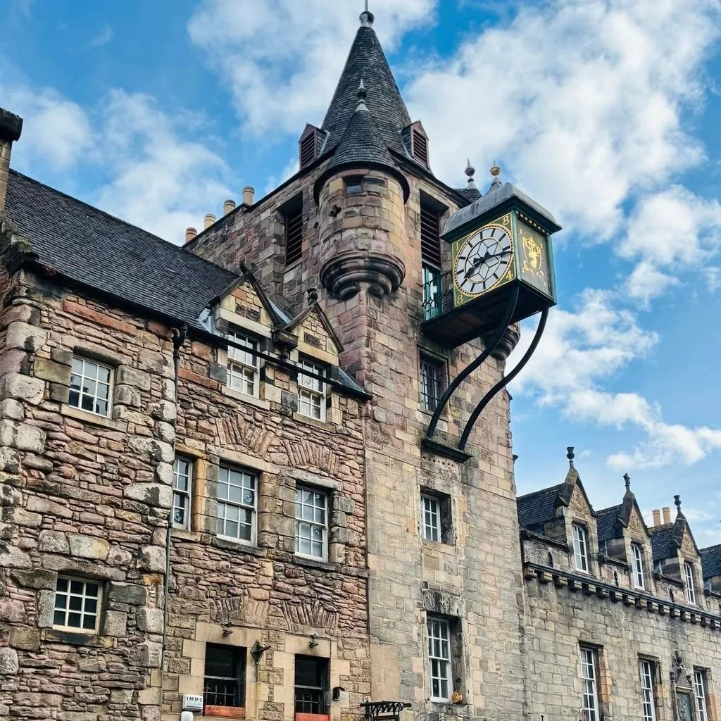 Canongate Tolbooth, a historic 16th-century building with a distinctive clock tower on Edinburgh’s Royal Mile, Scotland.