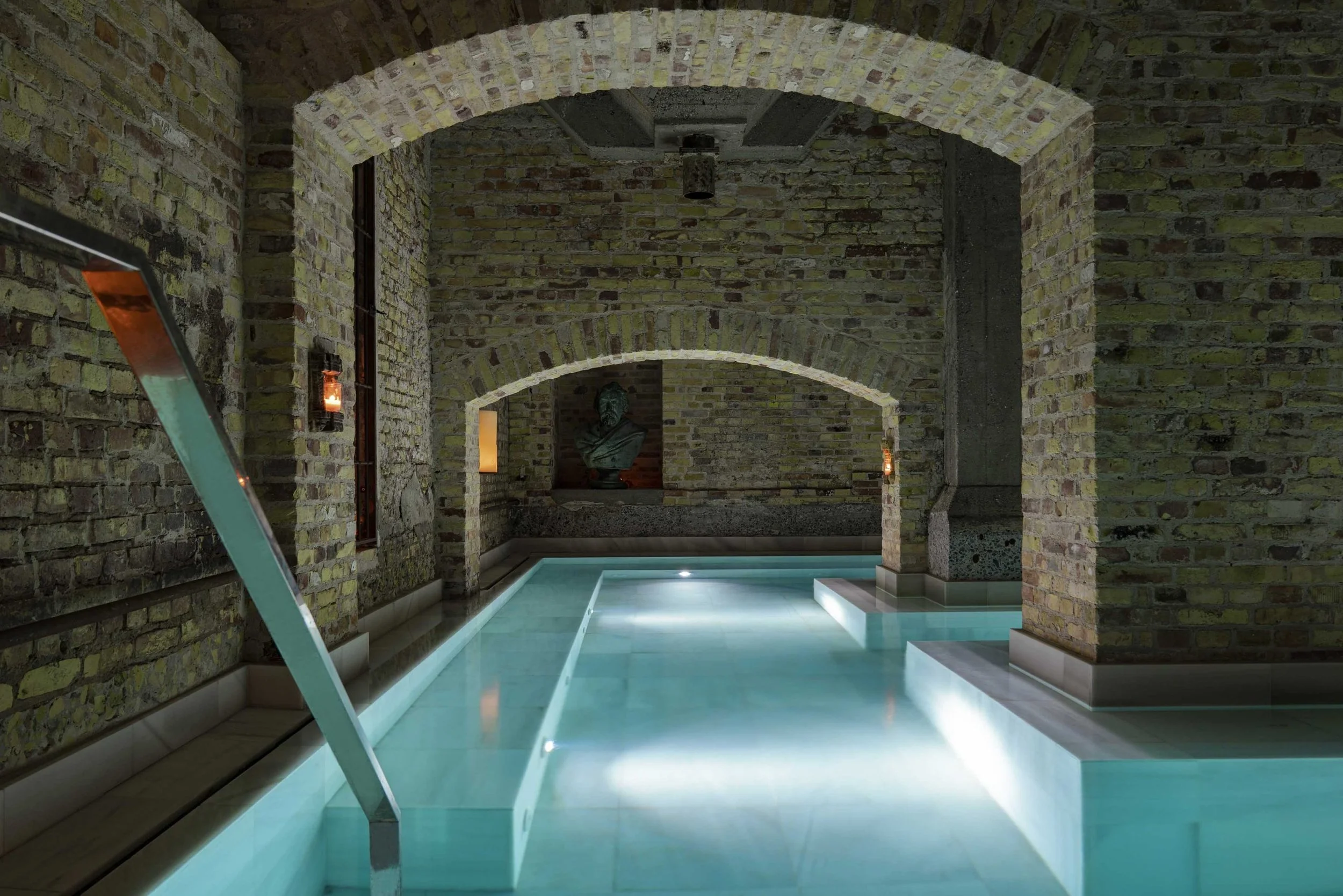 Candlelit thermal bathing pools, ancient baths spa, Copenhagen, Denmark