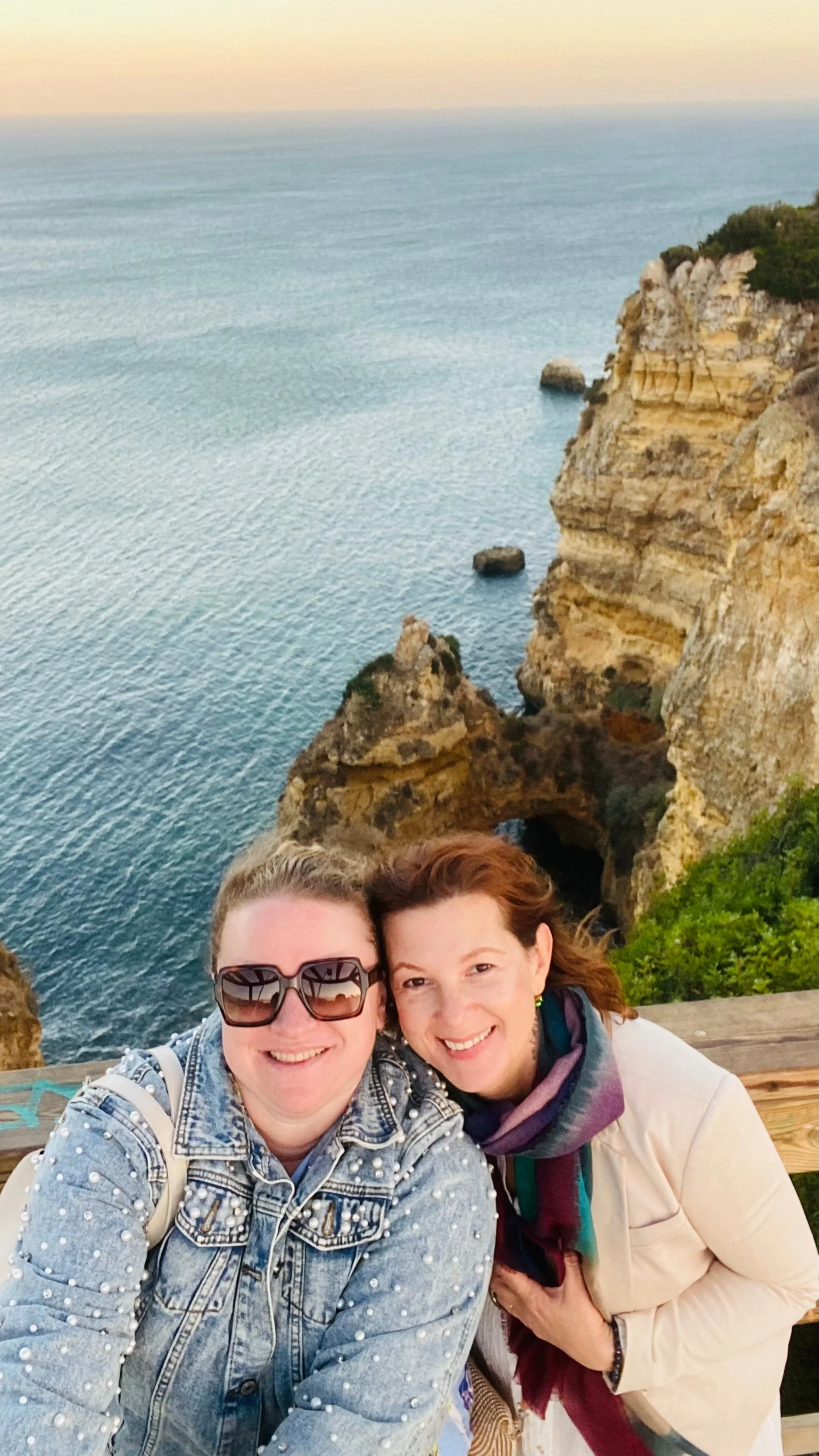 Ponta da Piedade in Lagos, Algarve, Portugal, featuring golden limestone cliffs and dramatic coastal rock formations.