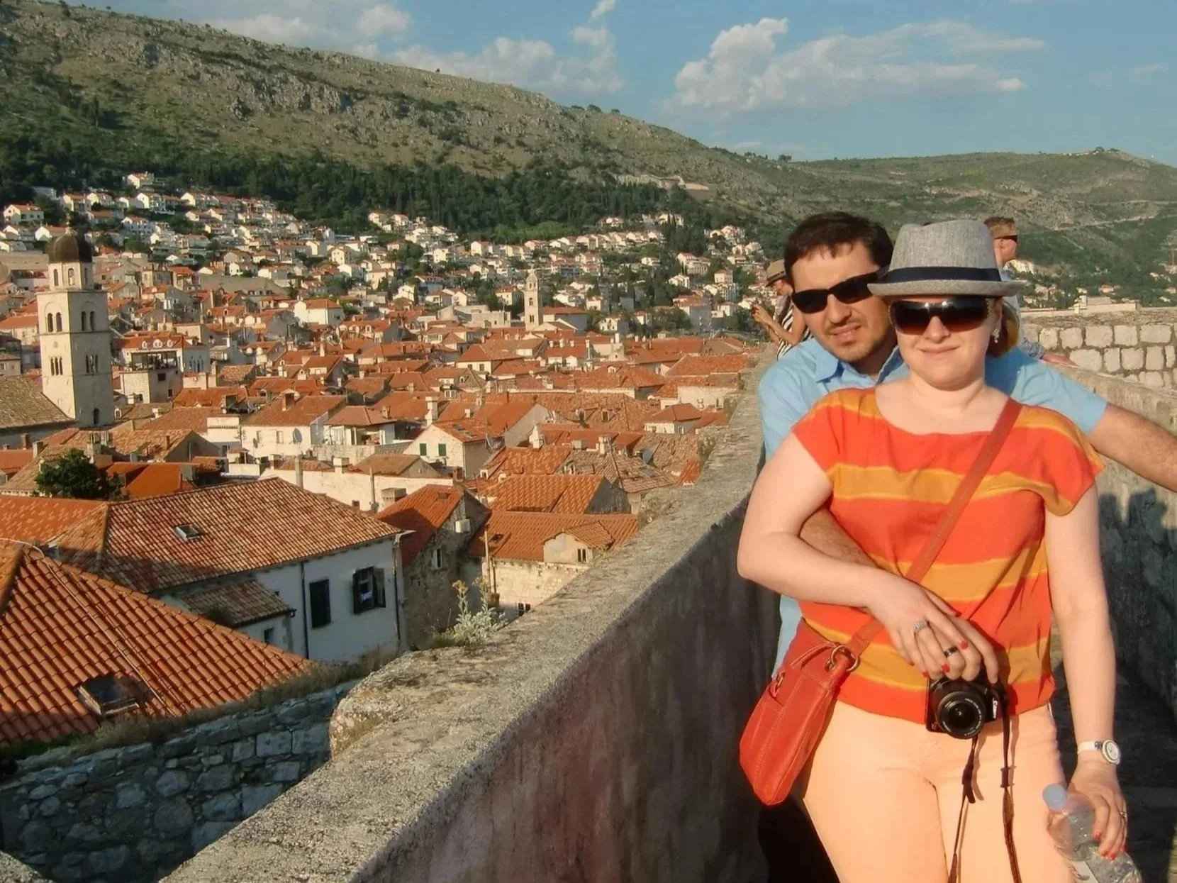 Walls of Dubrovnik, historic fortifications surrounding the Old Town with views of terracotta rooftops and Mount Srđ, Croatia.