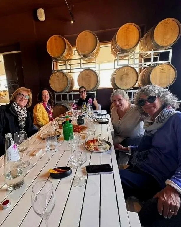 Barrel-room wine tasting at a Sicilian winery in the Marsala wine region, Sicily, Italy.