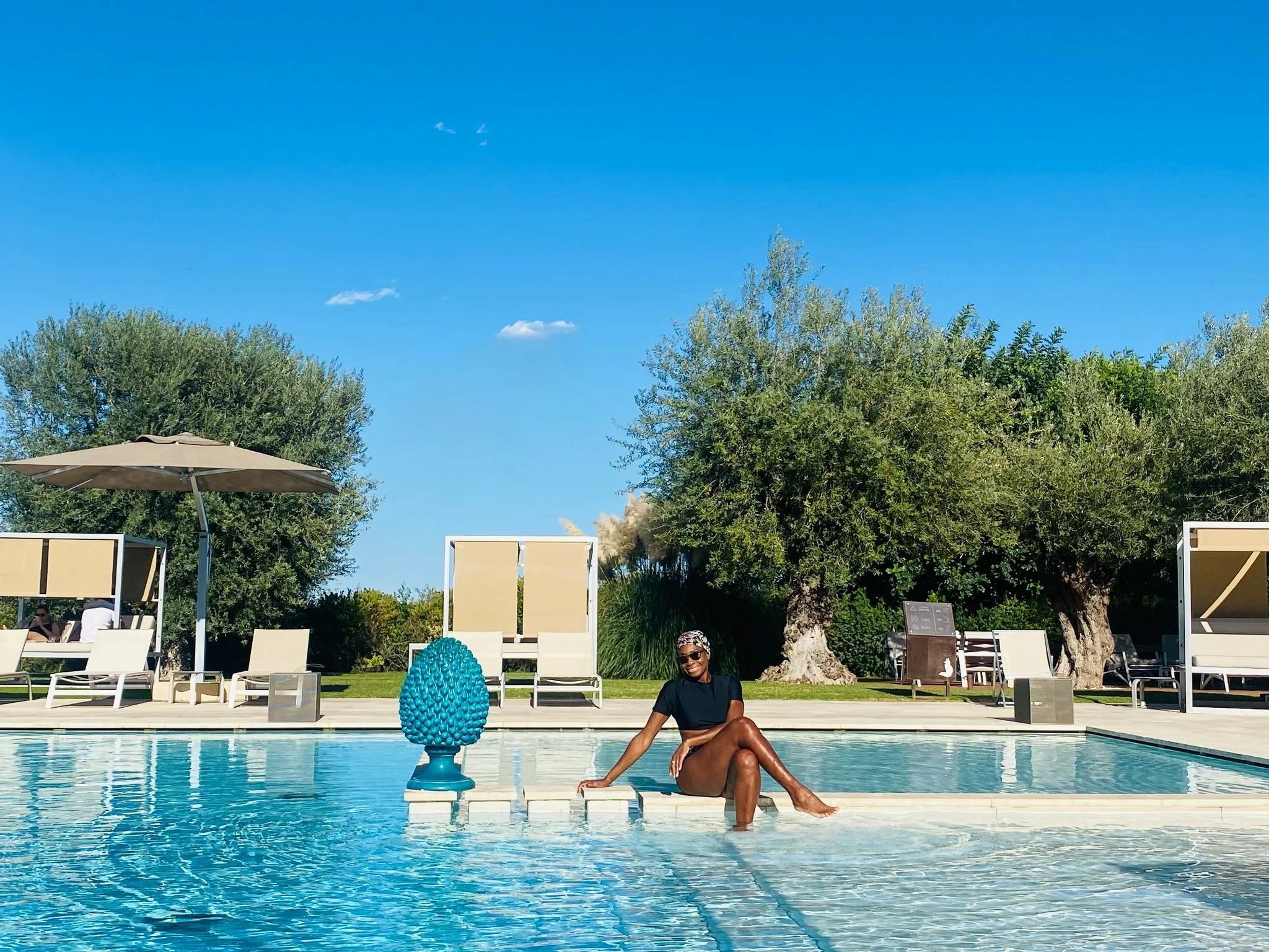 Olegana Travel Boutique’s women-only Sicily tour, featuring the outdoor pool at Masseria della Volpe in Noto, Sicily, Italy.