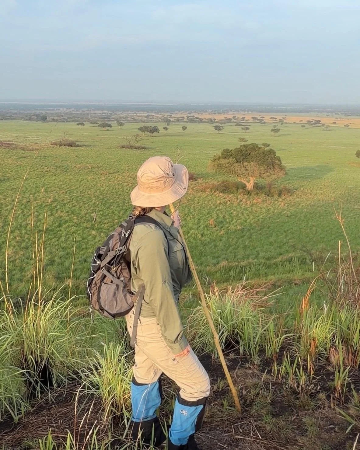Solo woman on luxury safari game drive in the Maasai Mara Kenya