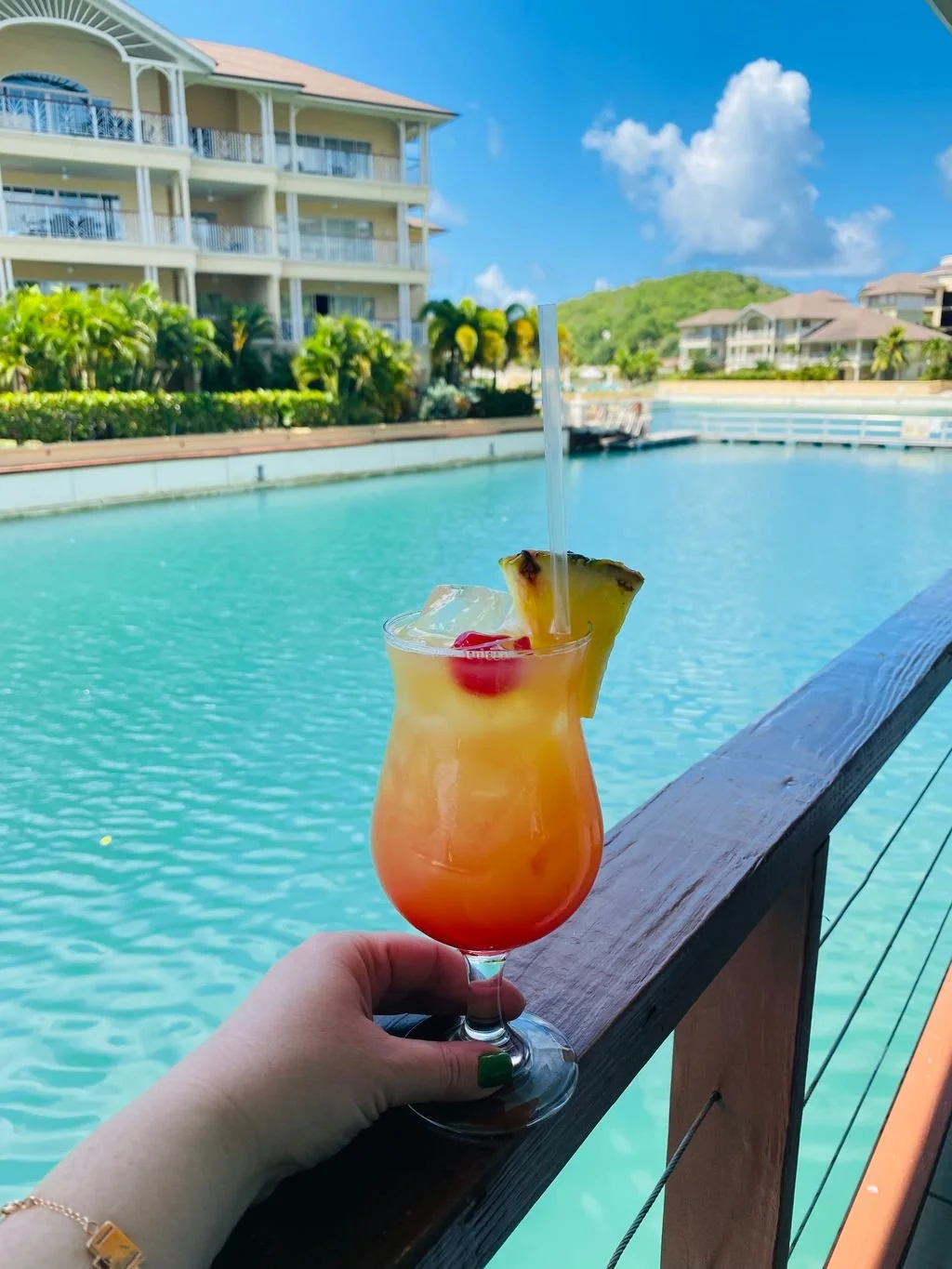 The Landings, a luxury resort pool surrounded by tropical landscaping in Saint Lucia.