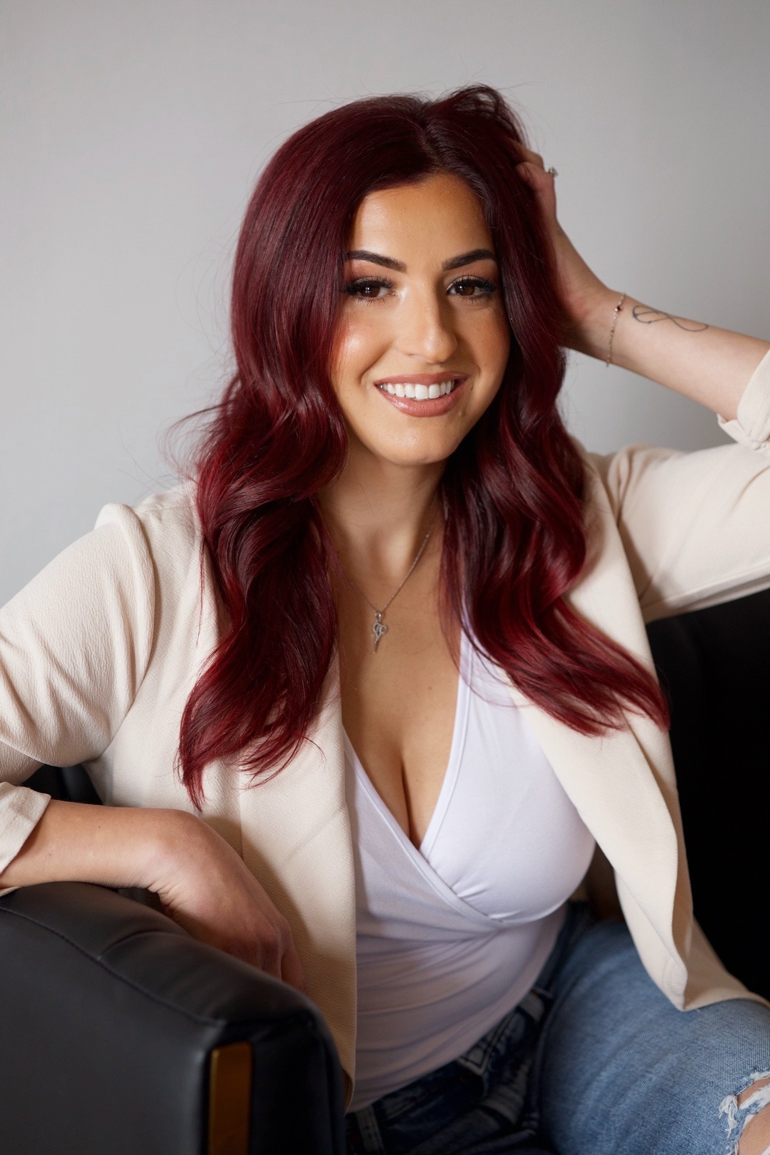 Nicole Macc, independent hairstylist and educator, representing her personal brand and client experience.