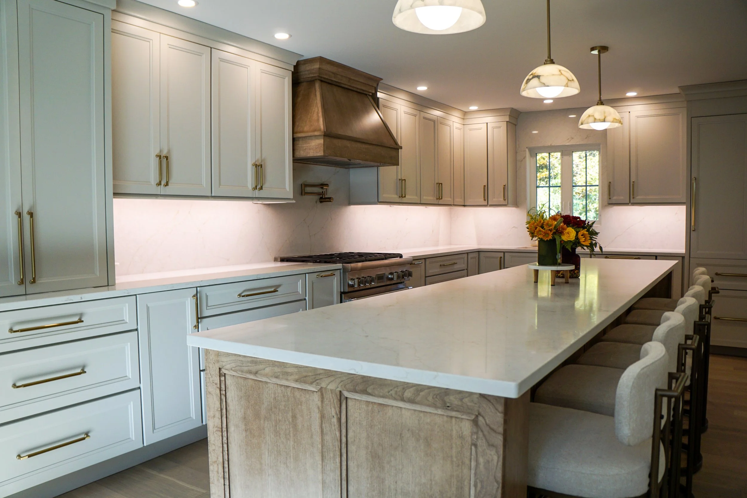 Modern kitchen remodel by Cyr Kitchen & Bath featuring updated cabinetry and finishes.