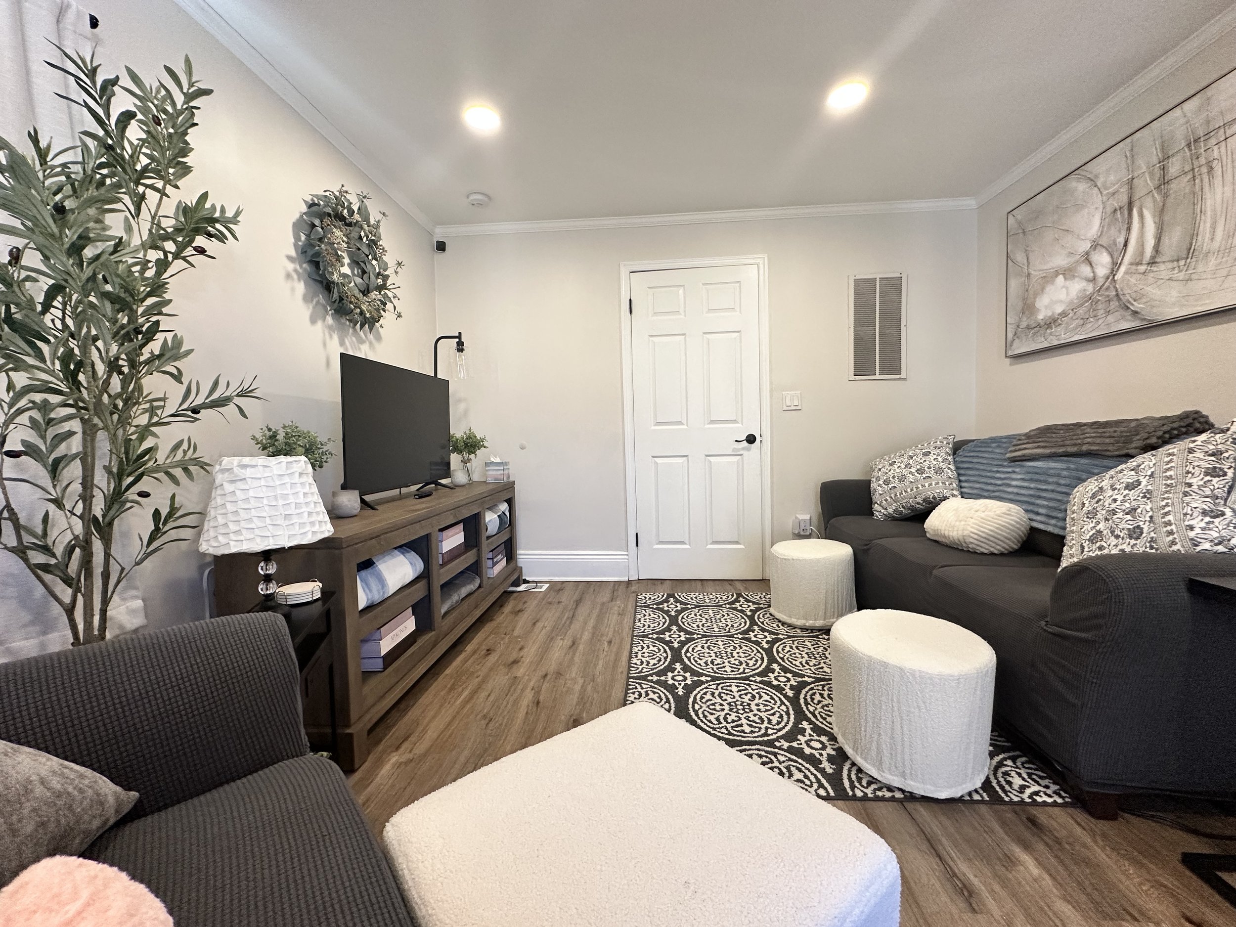 Spacious, sun-filled, and tastefully decorated
Large flat-screen smart TV with streaming capabilities
Cozy lighting for a warm and inviting atmosphere
Great space for movie nights, game nights, or relaxing after a day of exploring