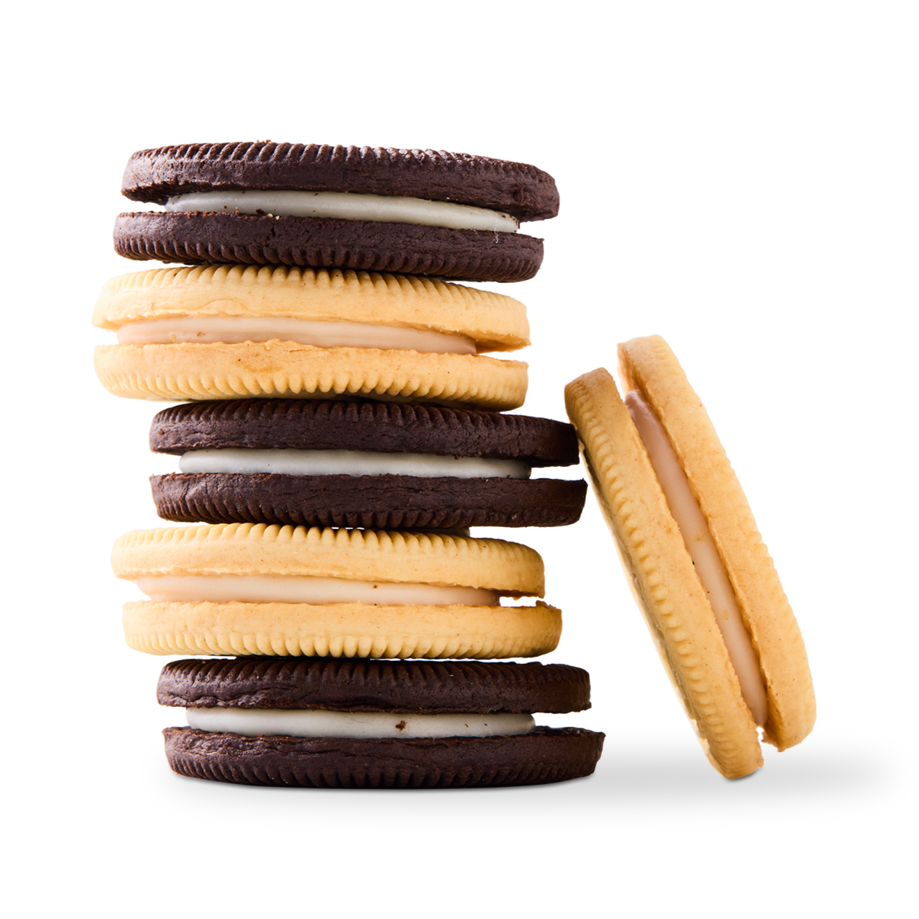 Stack of chocolate and vanilla sandwich cookies with cream filling, with one cookie leaning against the stack.