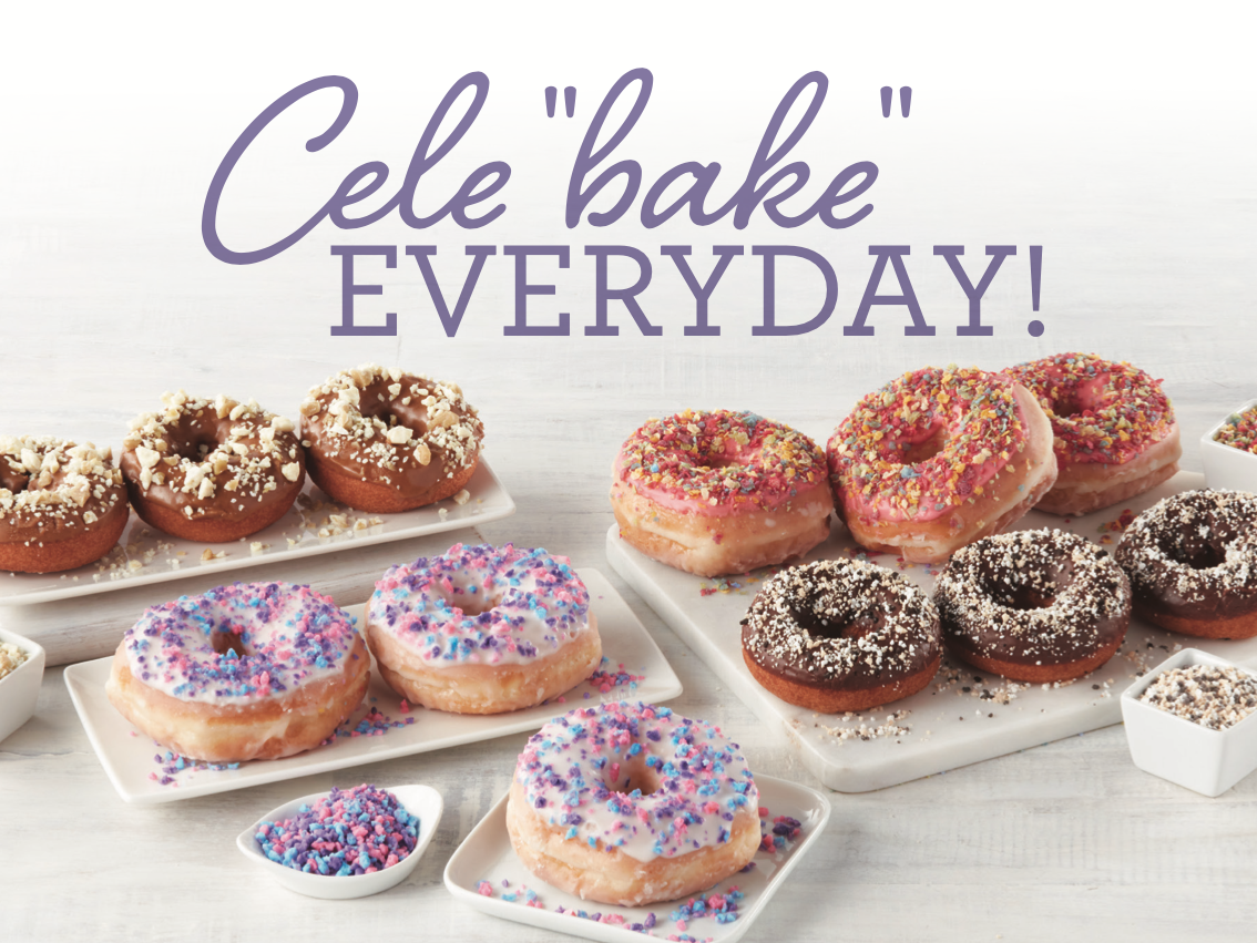 Assorted donuts with colorful sprinkles, chocolate, and icing on white plates, with the text "Cele'bake' EVERYDAY!" in purple above them.