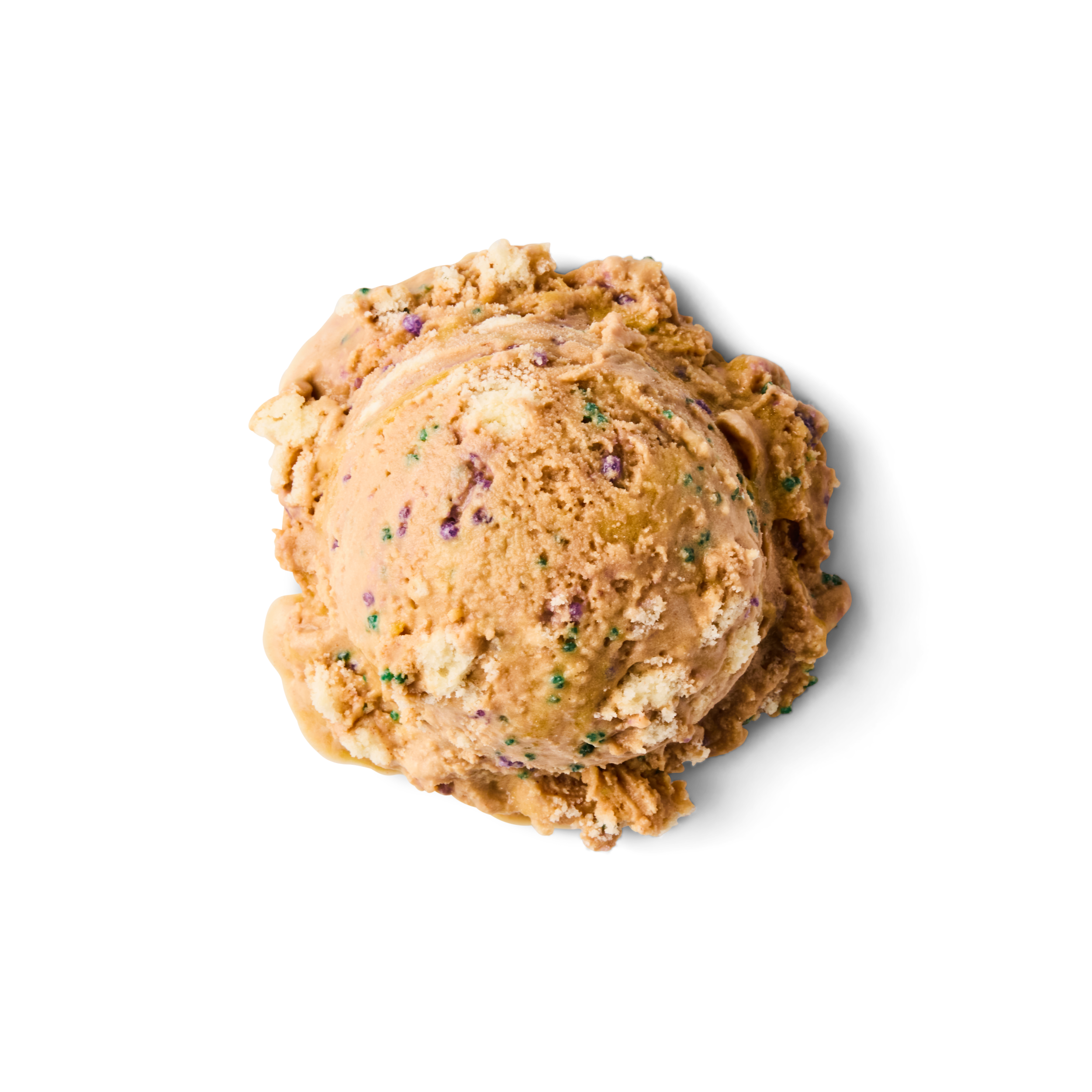 A scoop of colorful sprinkles ice cream on a black background.