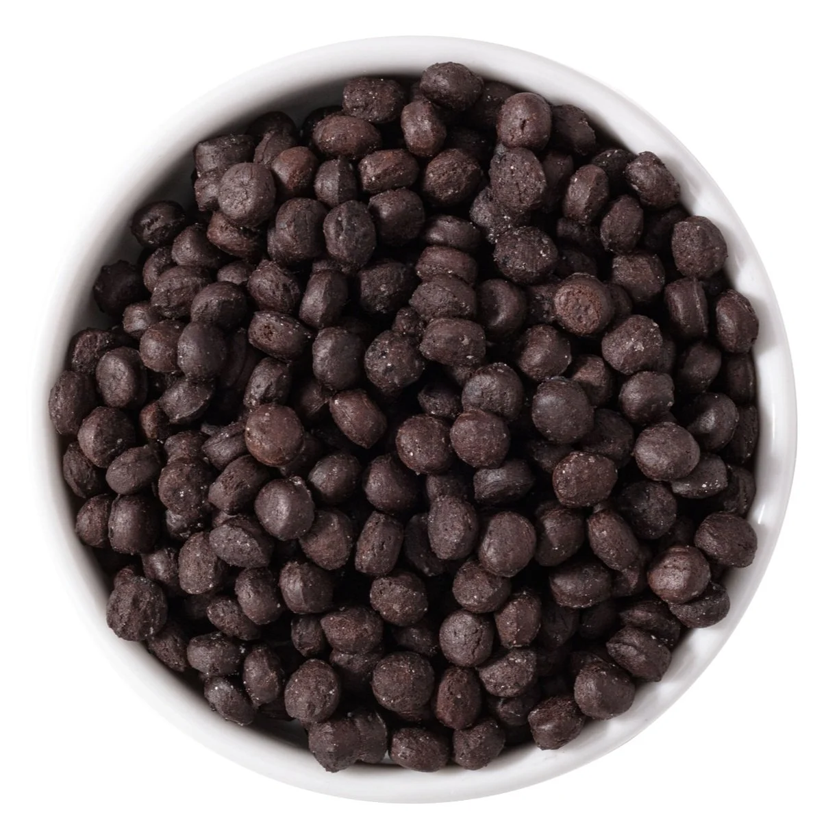 A white bowl filled with small, round, dark chocolate-coated candies.